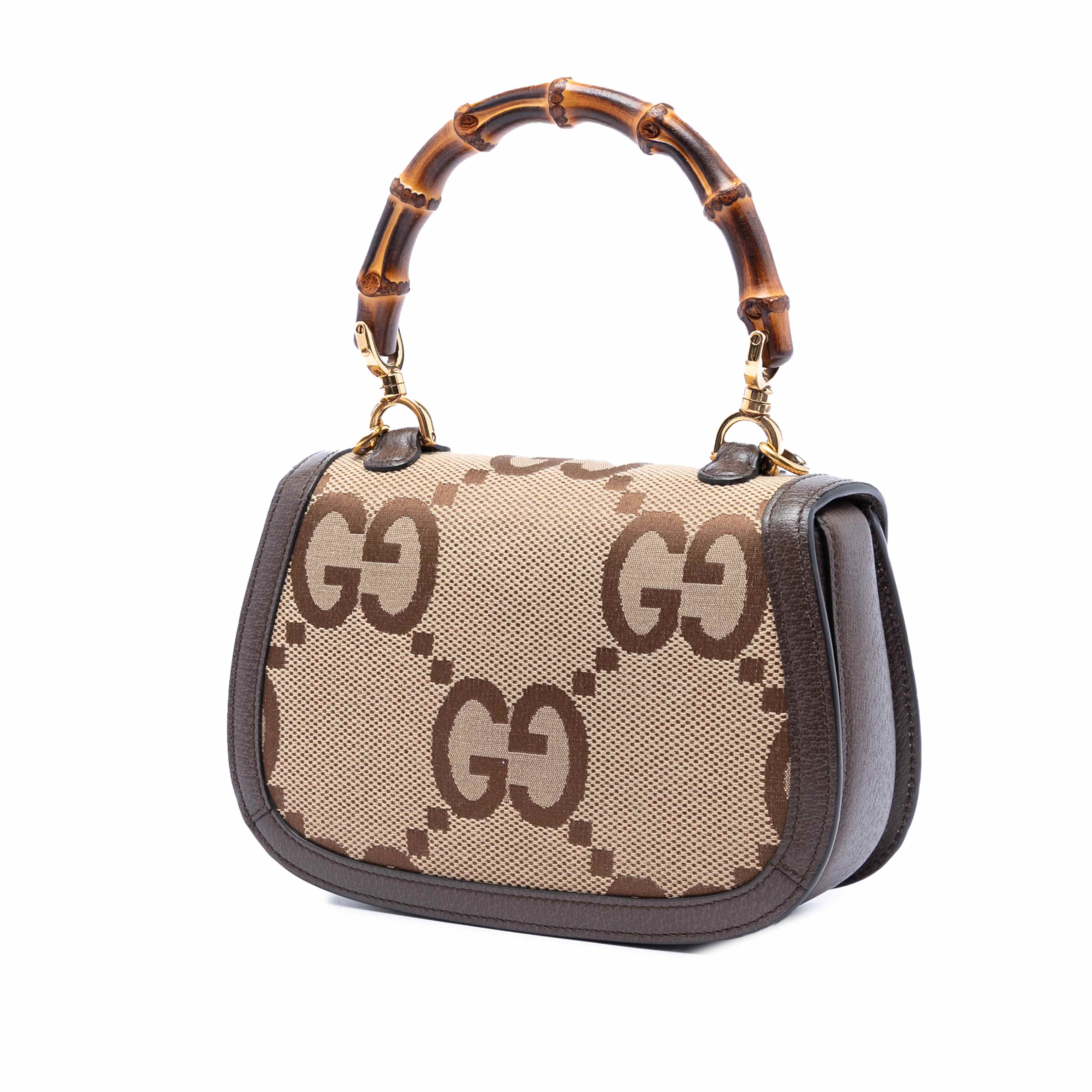 Gucci Small Jumbo Gg Canvas Bamboo 1947 Top Handle Bag, från Luxclusif, i färgen beige. Klicka för att öppna bilden i stort format