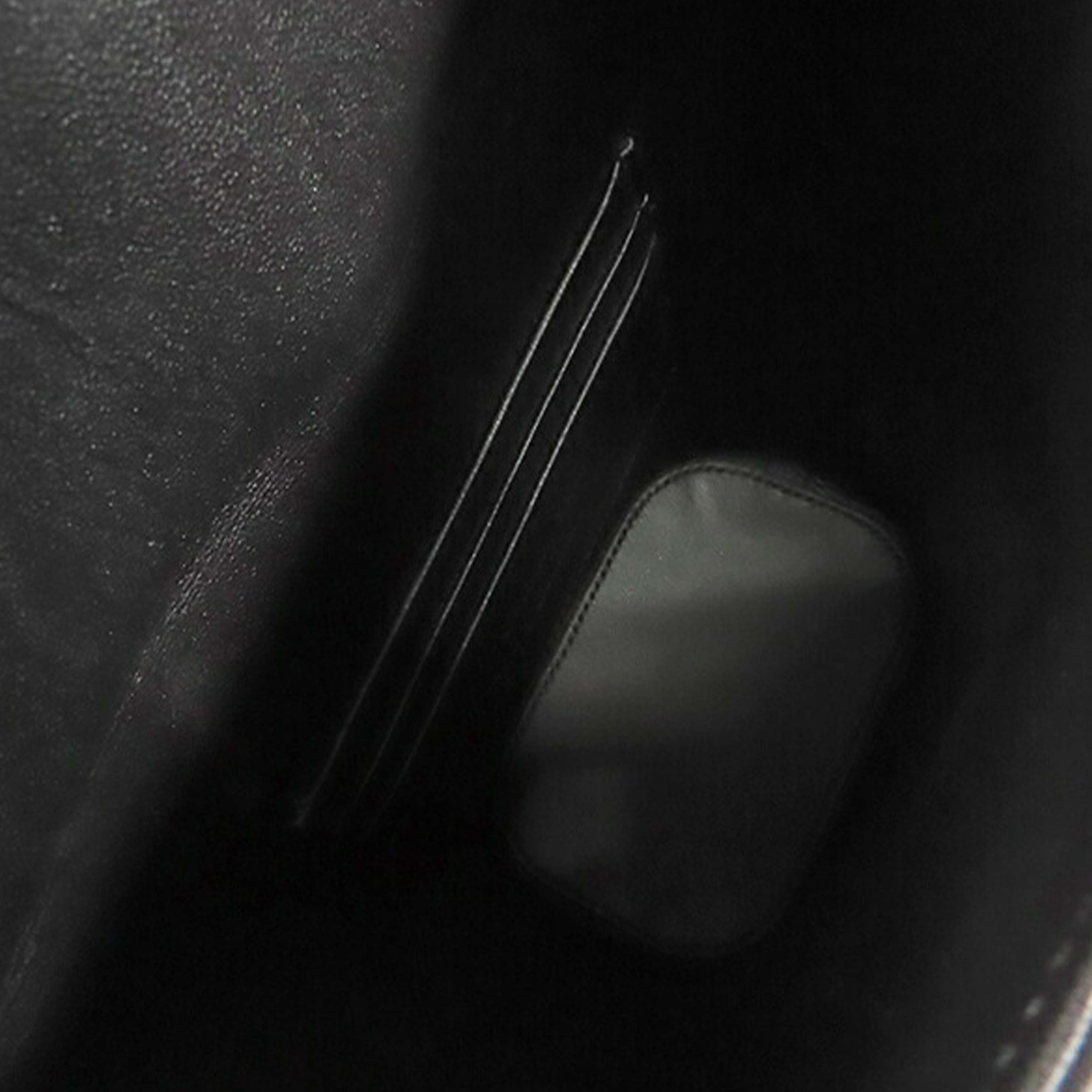 Dior Mini Calfskin 30 Montaigne Amber Bucket Bag, från Luxclusif, i färgen black. Klicka för att öppna bilden i stort format