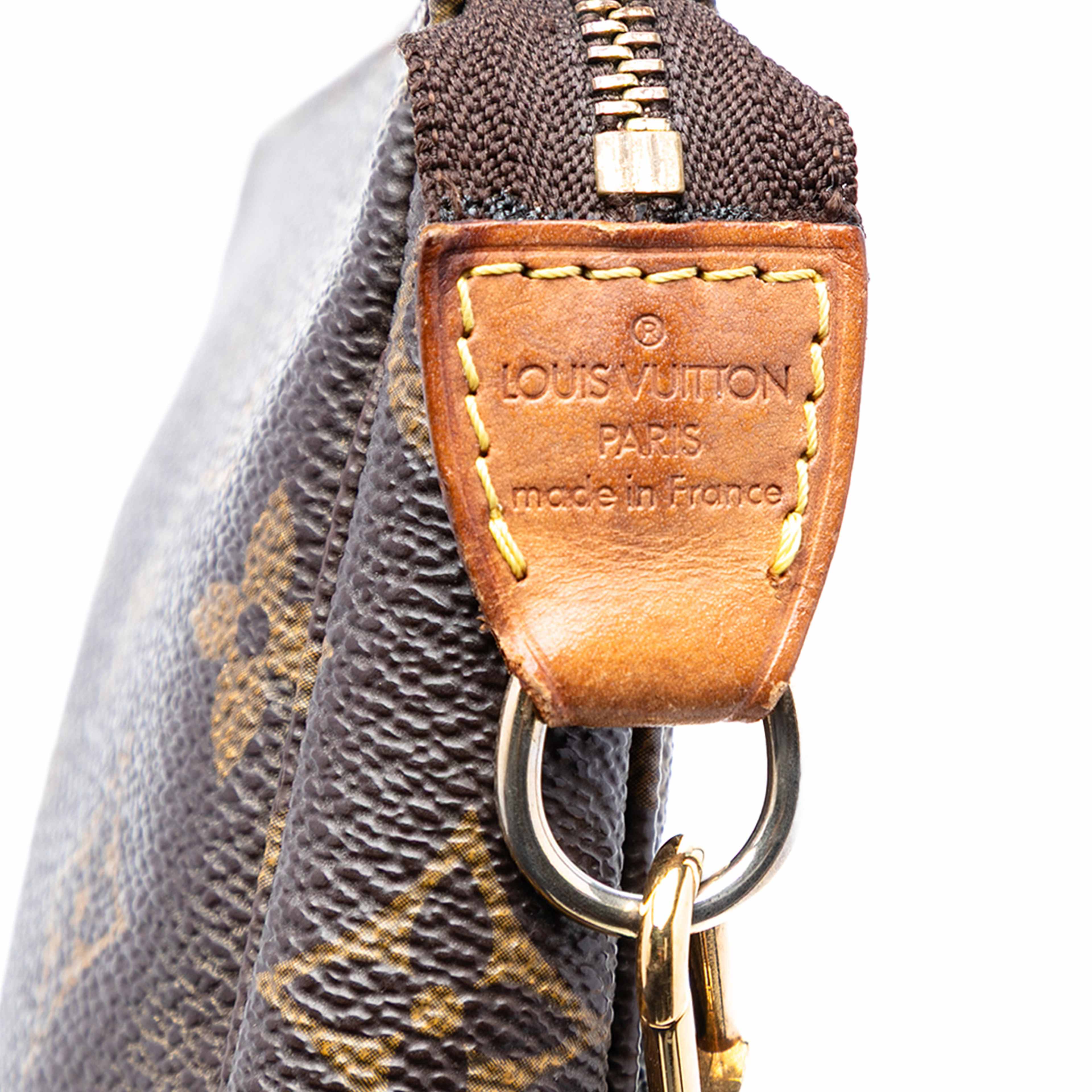 Louis Vuitton Monogram Pochette Accessoires, från Luxclusif, i färgen brown. Klicka för att öppna bilden i stort format