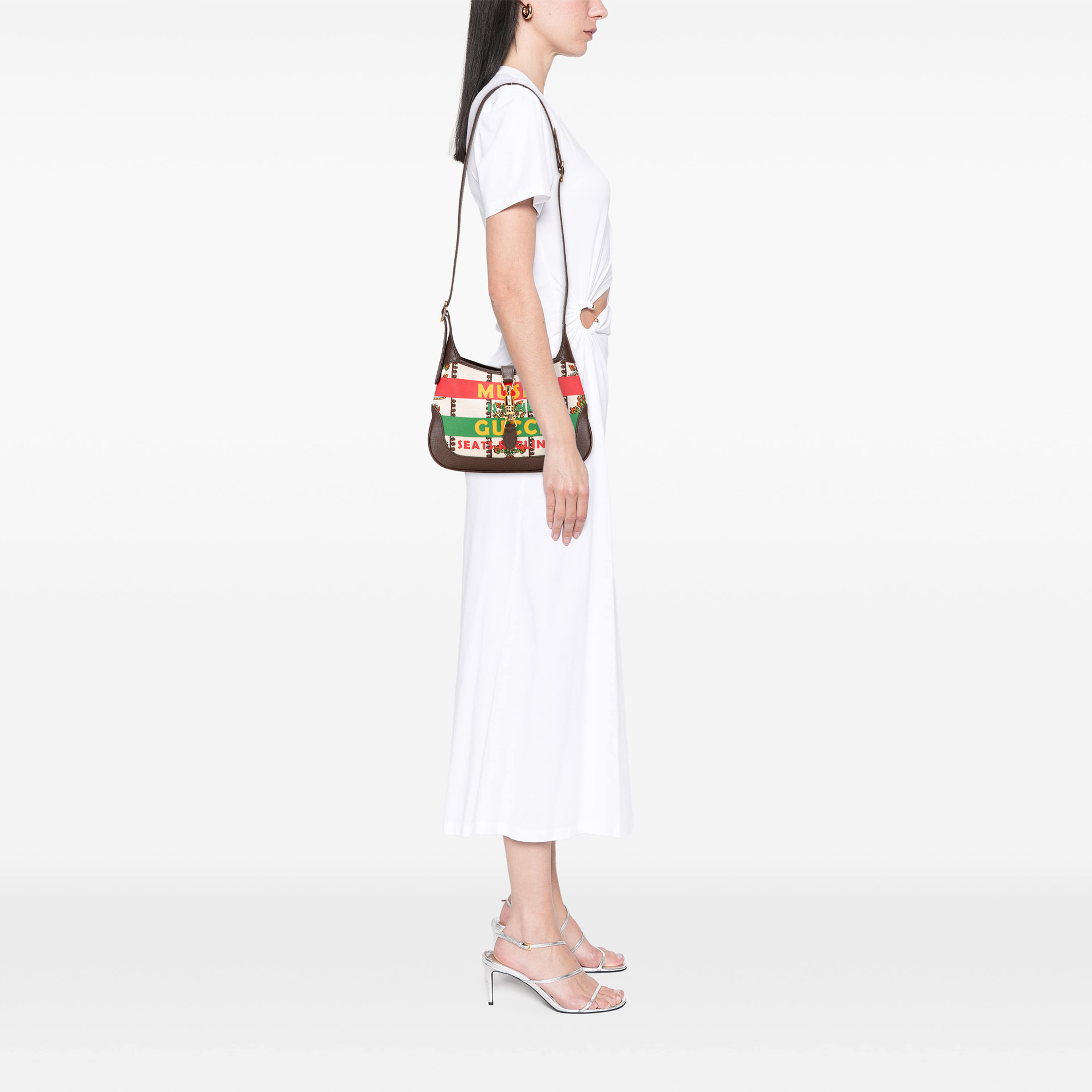 Gucci Small Canvas 100 Centennial Music Jackie 1961 Crossbody, från Luxclusif, i färgen brun. Klicka för att öppna bilden i stort format