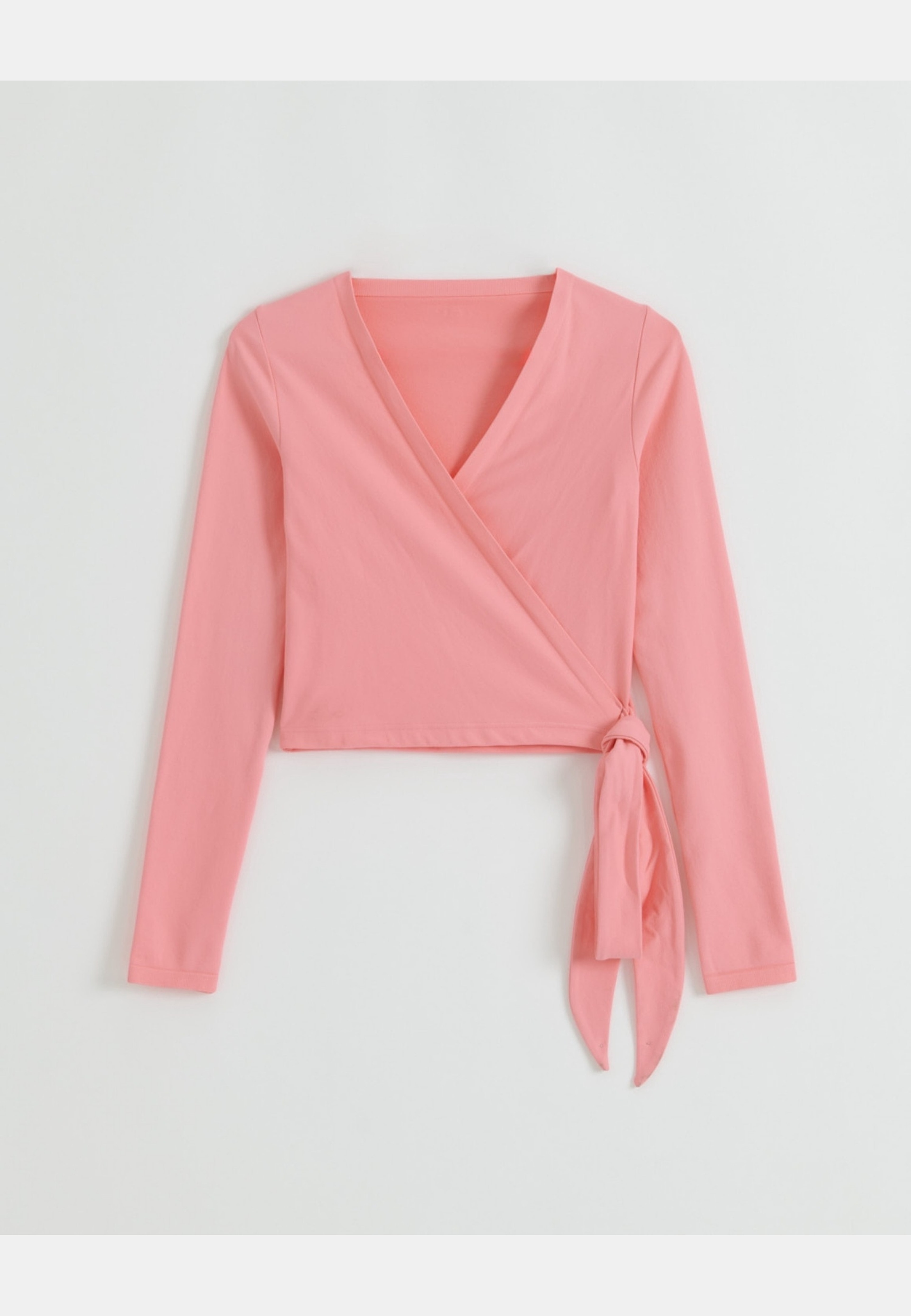 Shape Seamless Wrap Long Sleeve, från aim'n, i färgen blush. Klicka för att öppna bilden i stort format