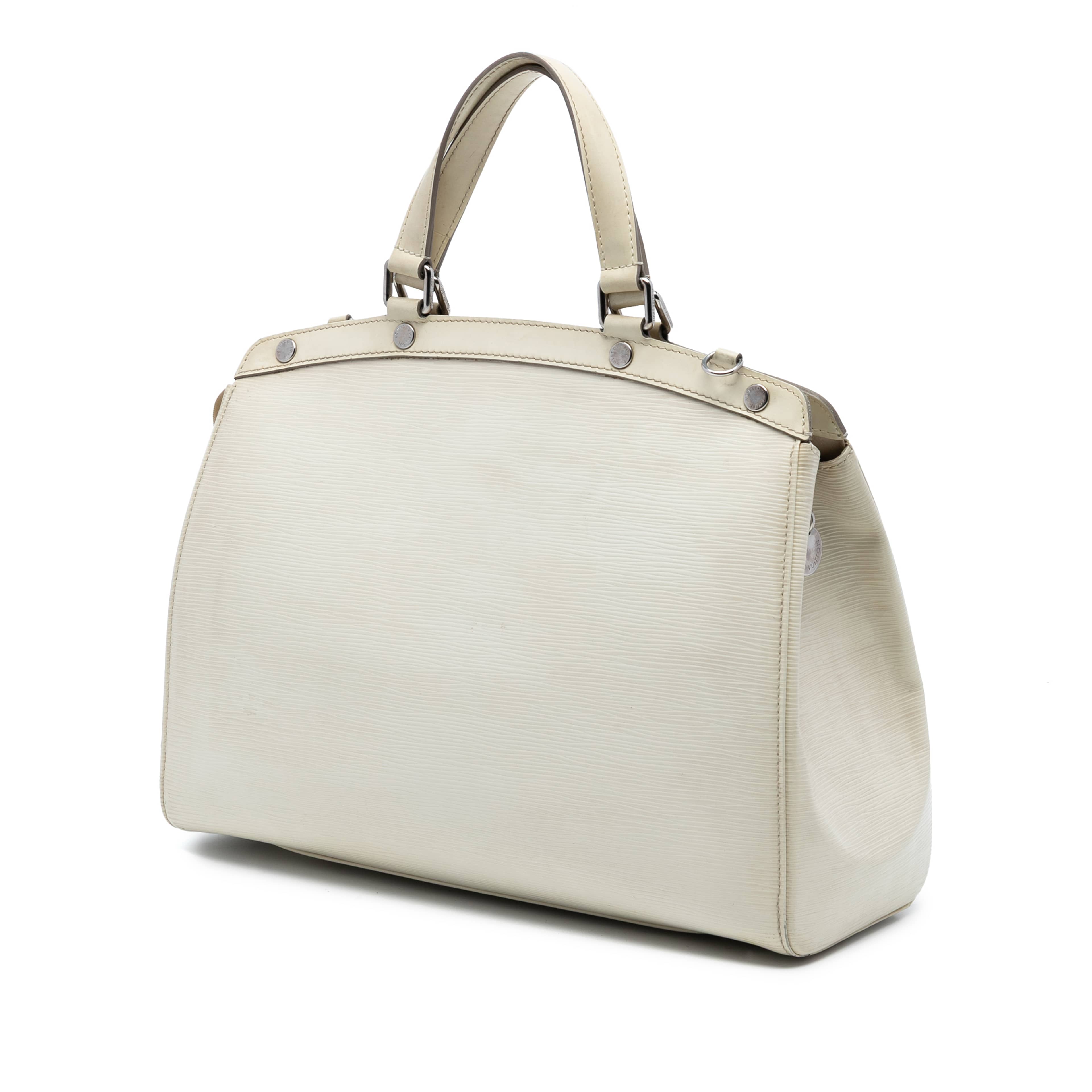 Louis Vuitton Epi Brea Gm, från Luxclusif, i färgen vit. Klicka för att öppna bilden i stort format
