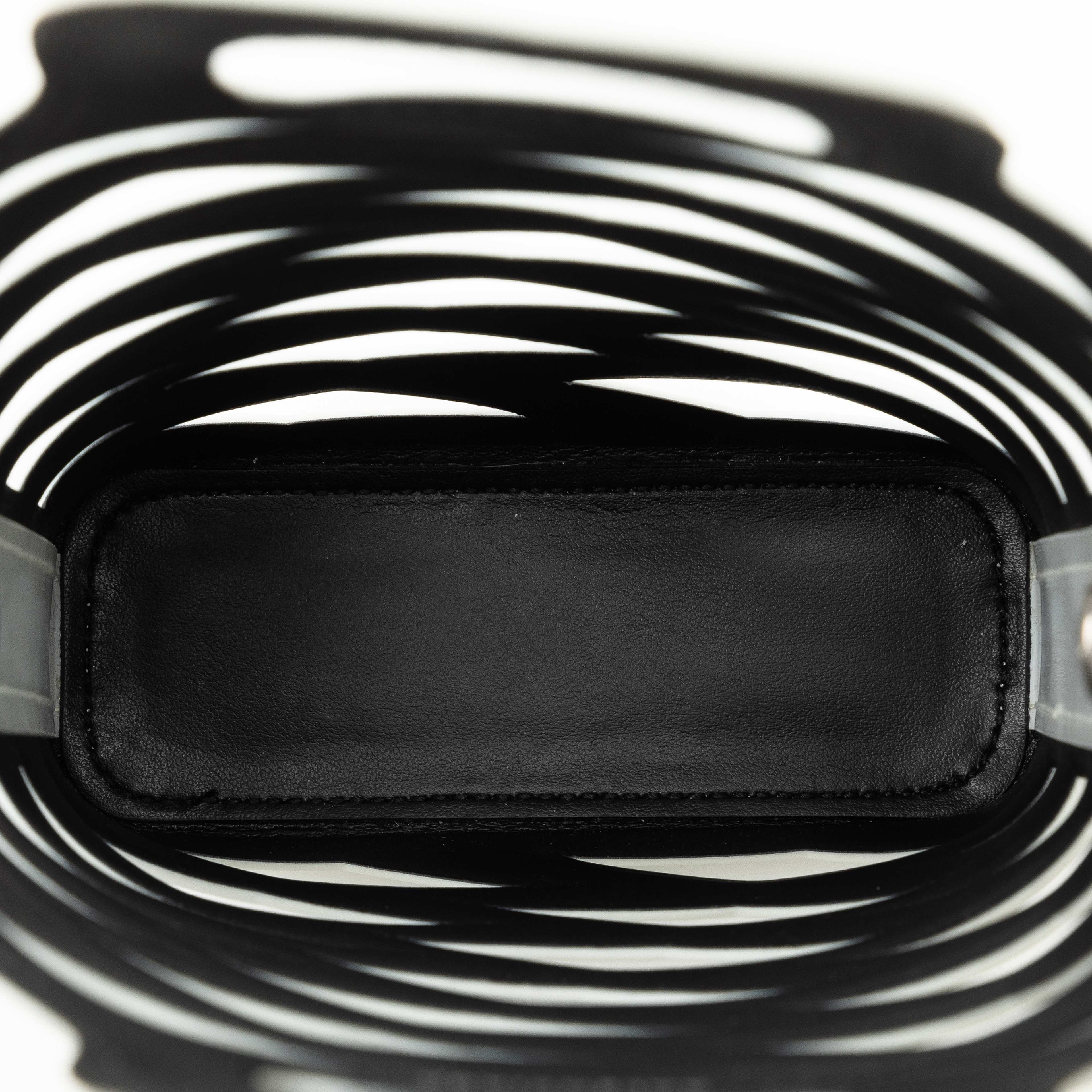 Balenciaga Neo Basket Phone Holder, från Luxclusif, i färgen white. Klicka för att öppna bilden i stort format