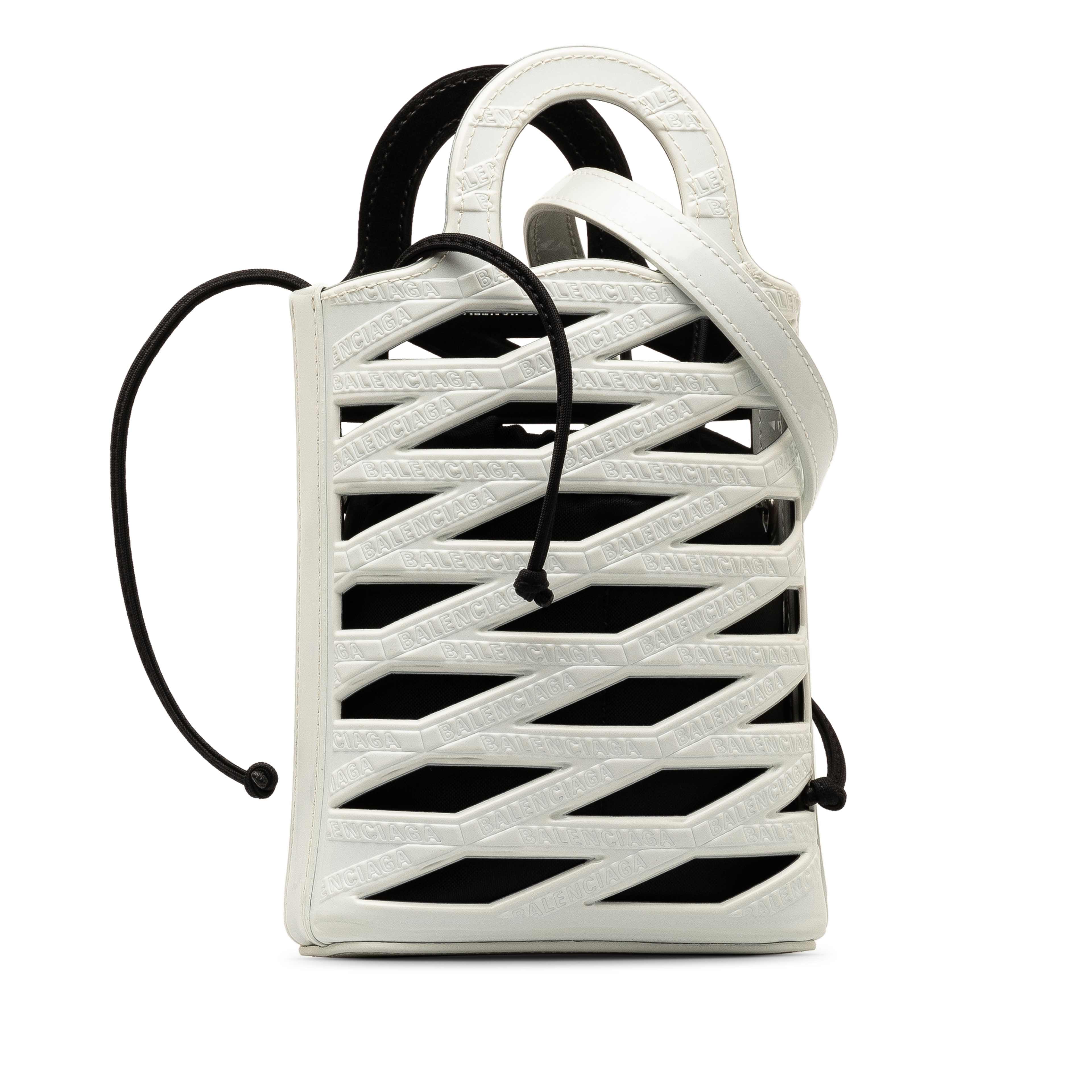 Balenciaga Neo Basket Phone Holder, från Luxclusif, i färgen white. Klicka för att öppna bilden i stort format