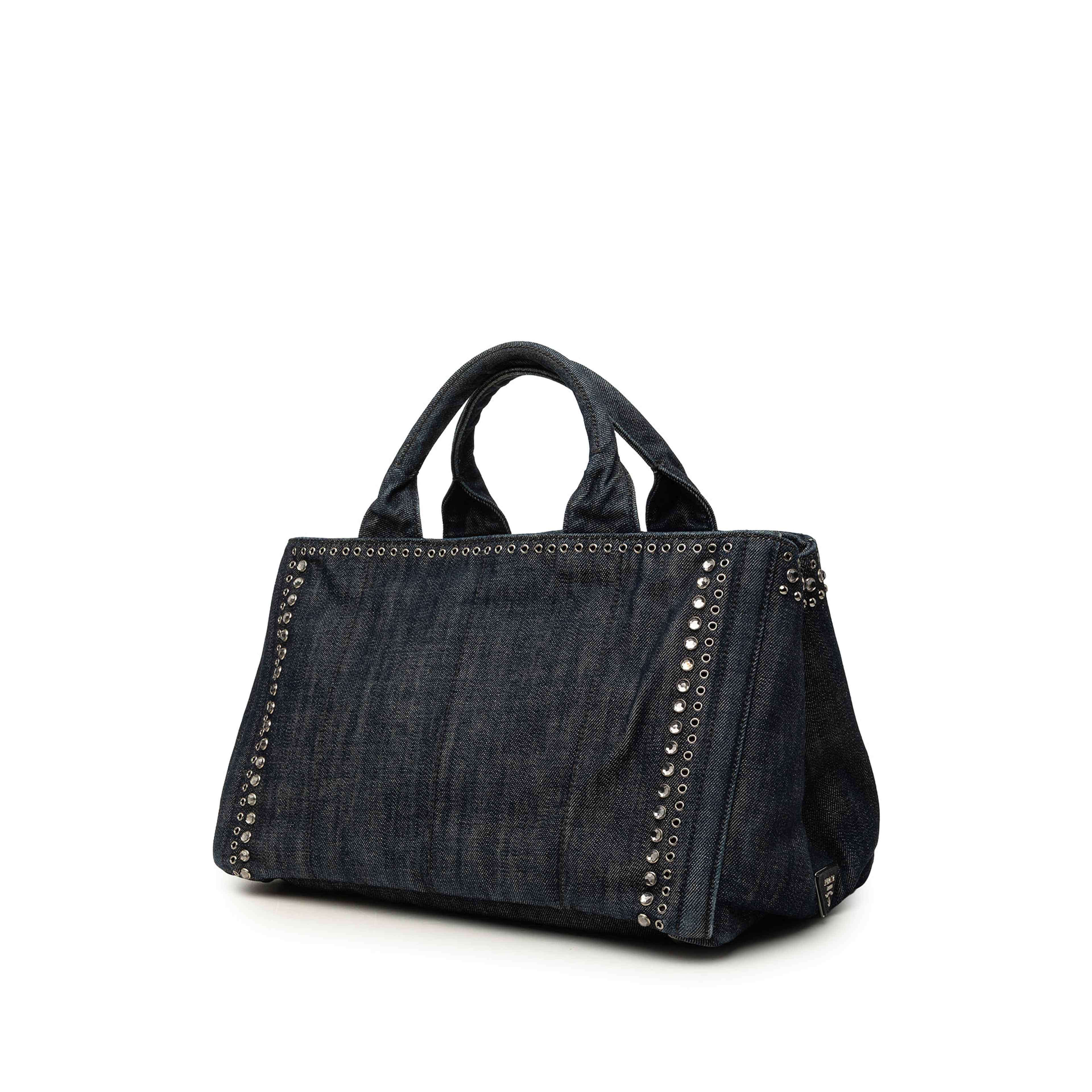 Prada Denim Canapa Bijoux And Grommet Tote, från Luxclusif, i färgen svart. Klicka för att öppna bilden i stort format
