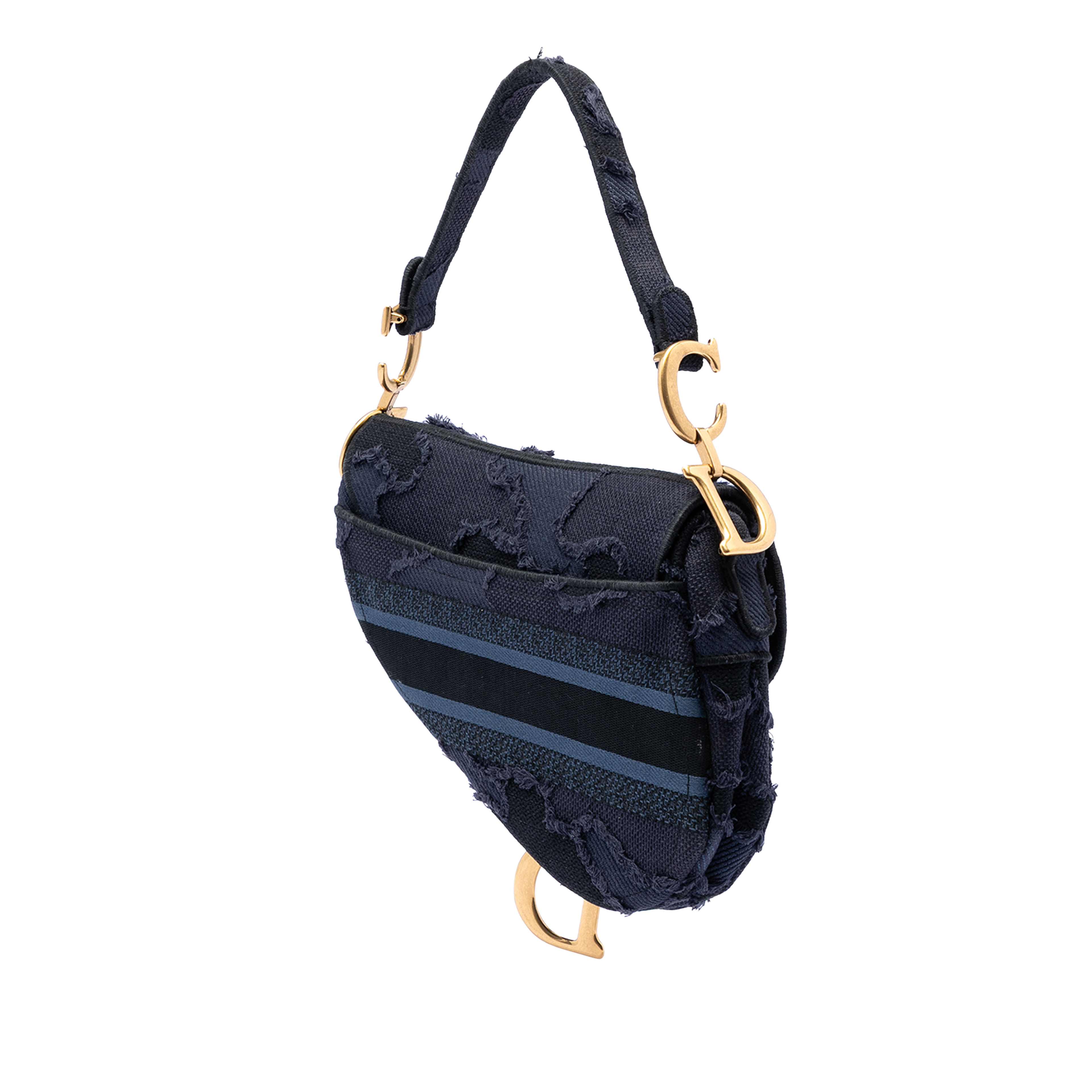 Dior Canvas Embroidered Camouflage Saddle Bag, från Luxclusif, i färgen dark blue. Klicka för att öppna bilden i stort format