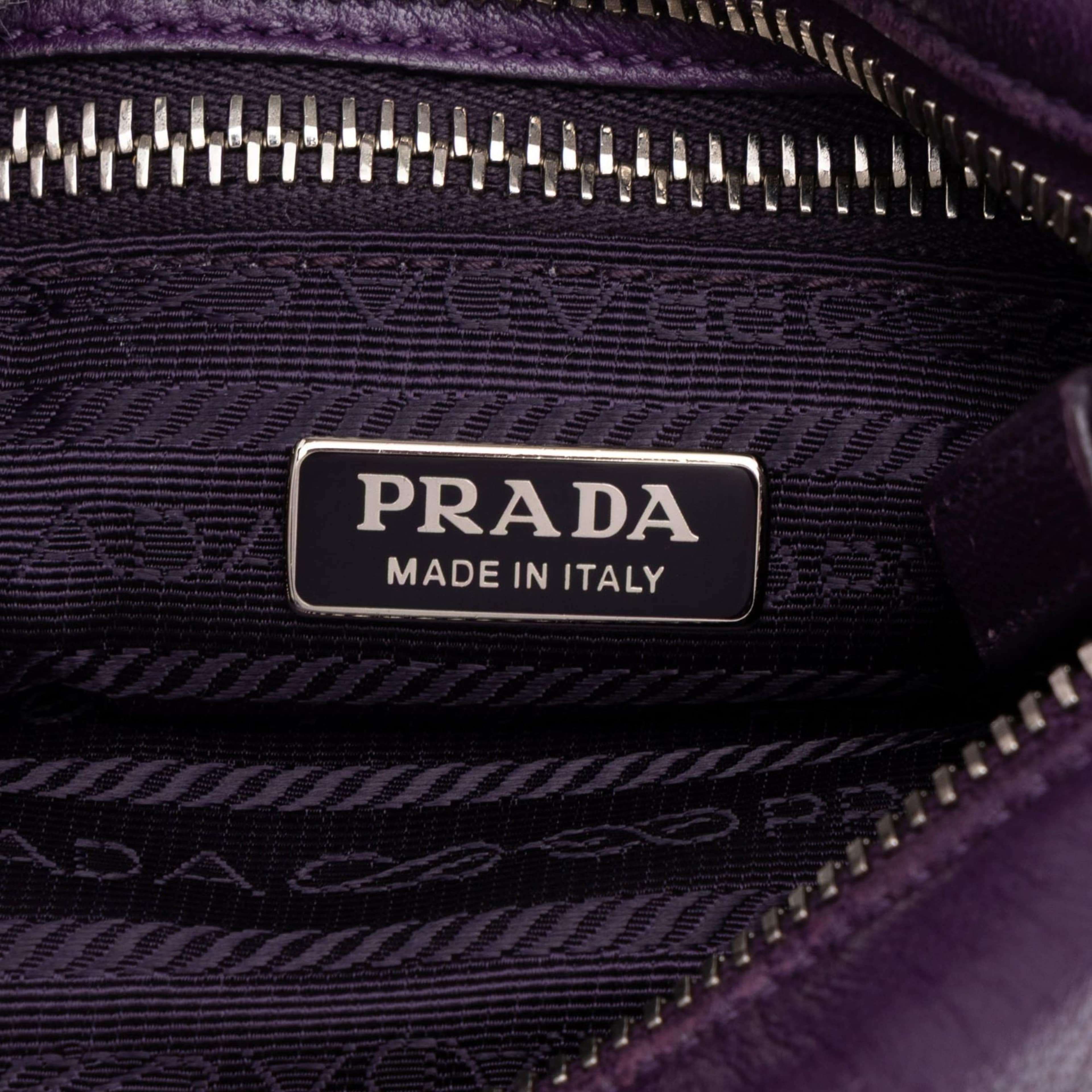 Prada Nappa Front Pocket Satchel, från Luxclusif, i färgen purpur. Klicka för att öppna bilden i stort format