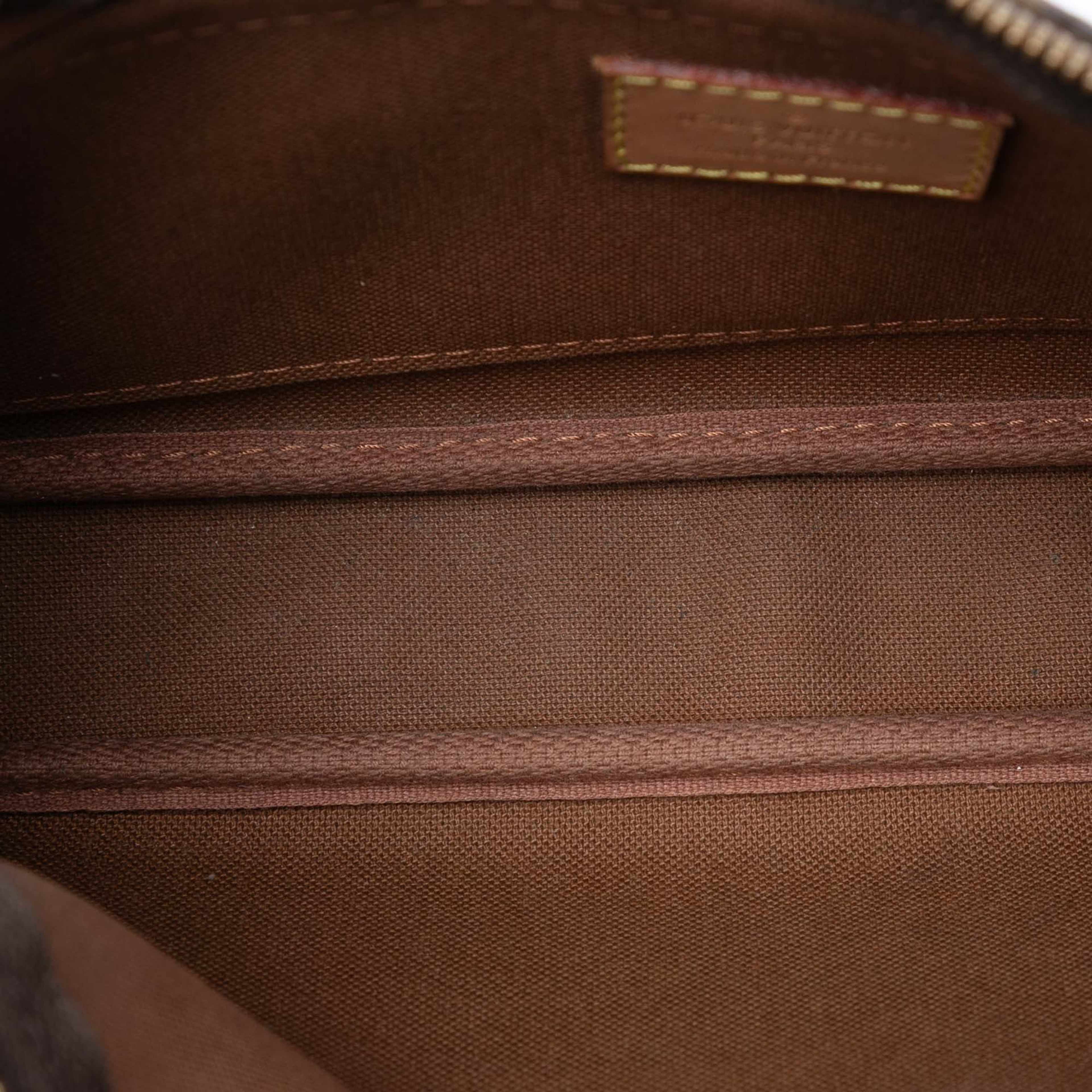 Louis Vuitton Monogram Multi Pochette Accessoires, från Luxclusif, i färgen brown. Klicka för att öppna bilden i stort format