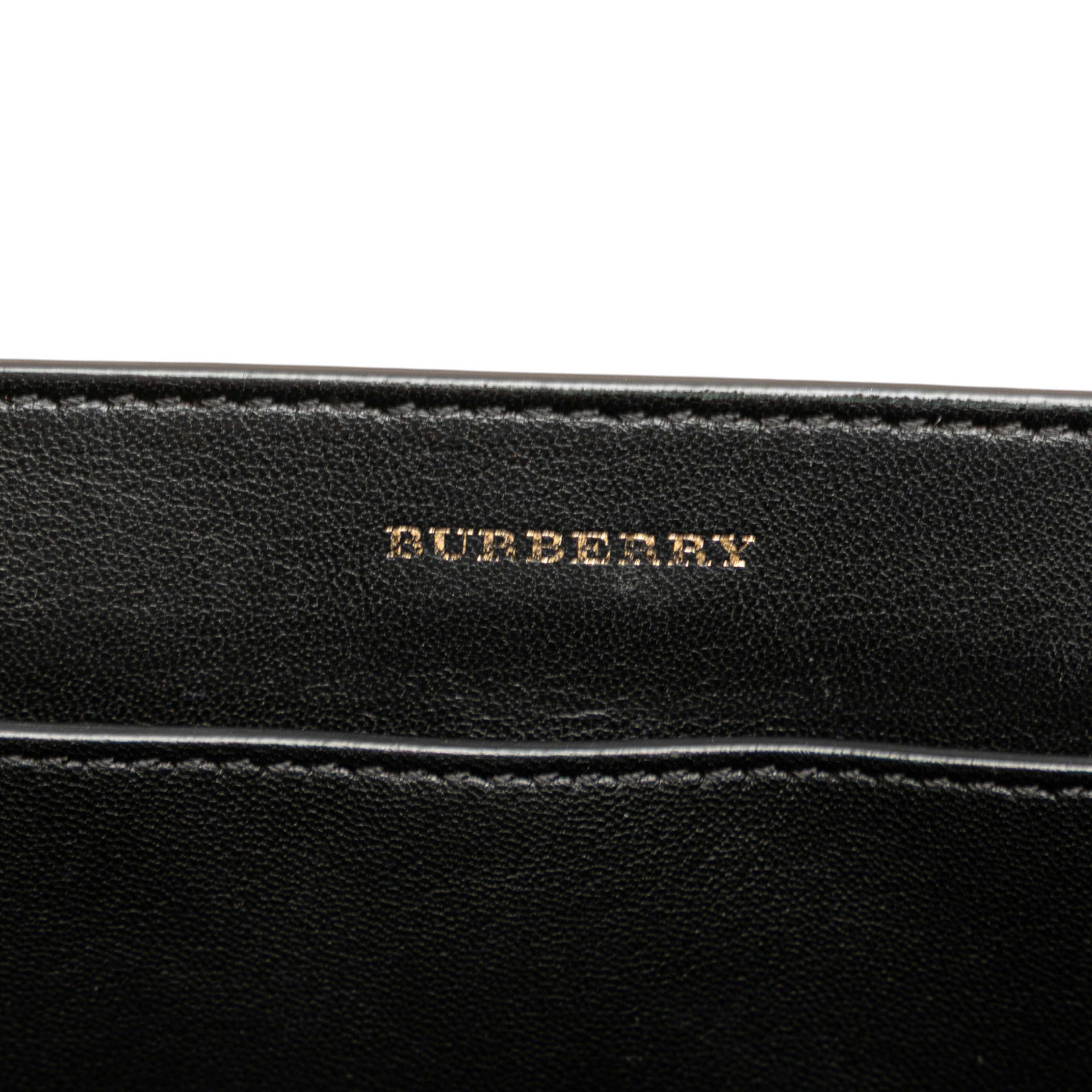 Burberry Small Grained Calfskin Belt Satchel, från Luxclusif, i färgen red. Klicka för att öppna bilden i stort format