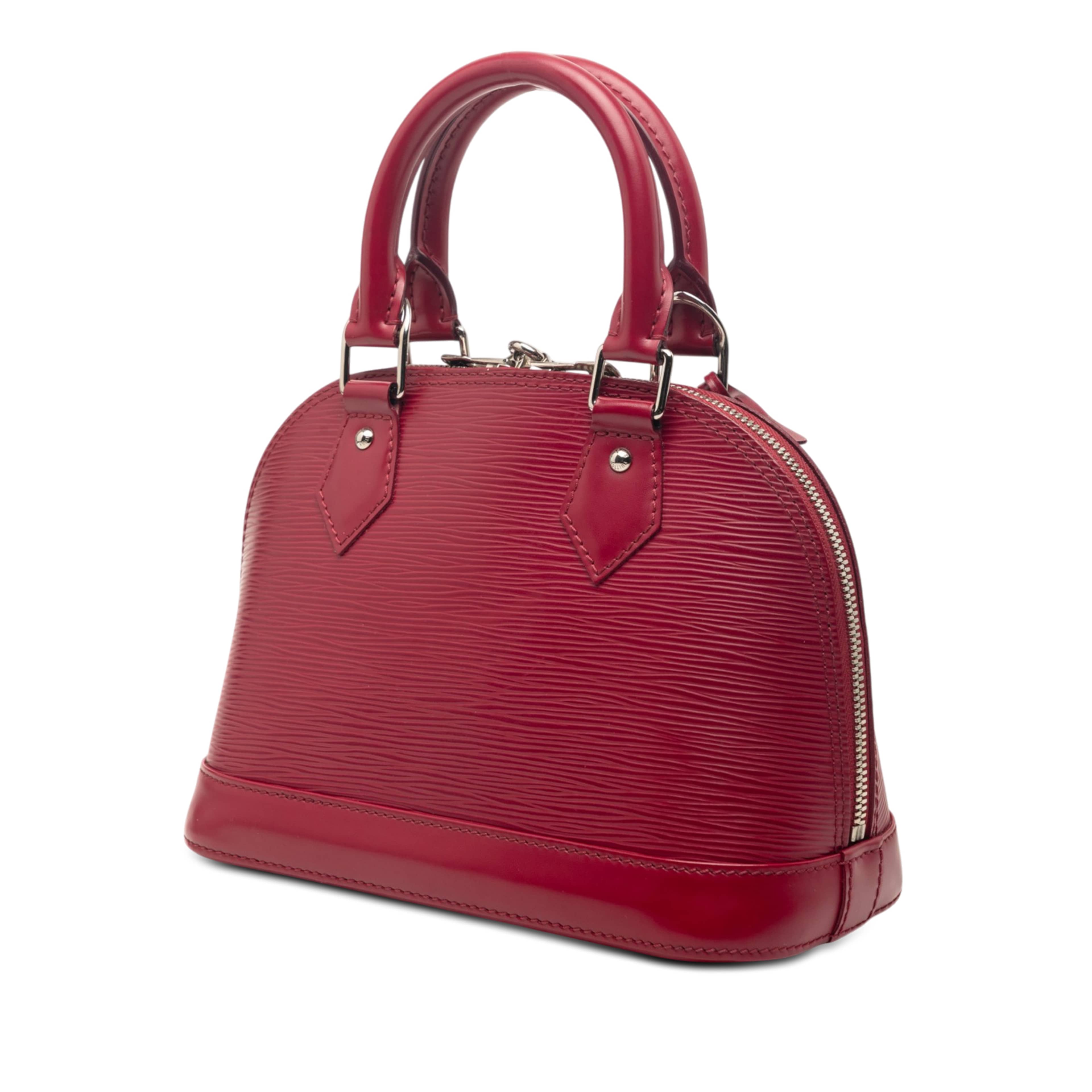 Louis Vuitton Epi Alma Bb, från Luxclusif, i färgen rosa. Klicka för att öppna bilden i stort format
