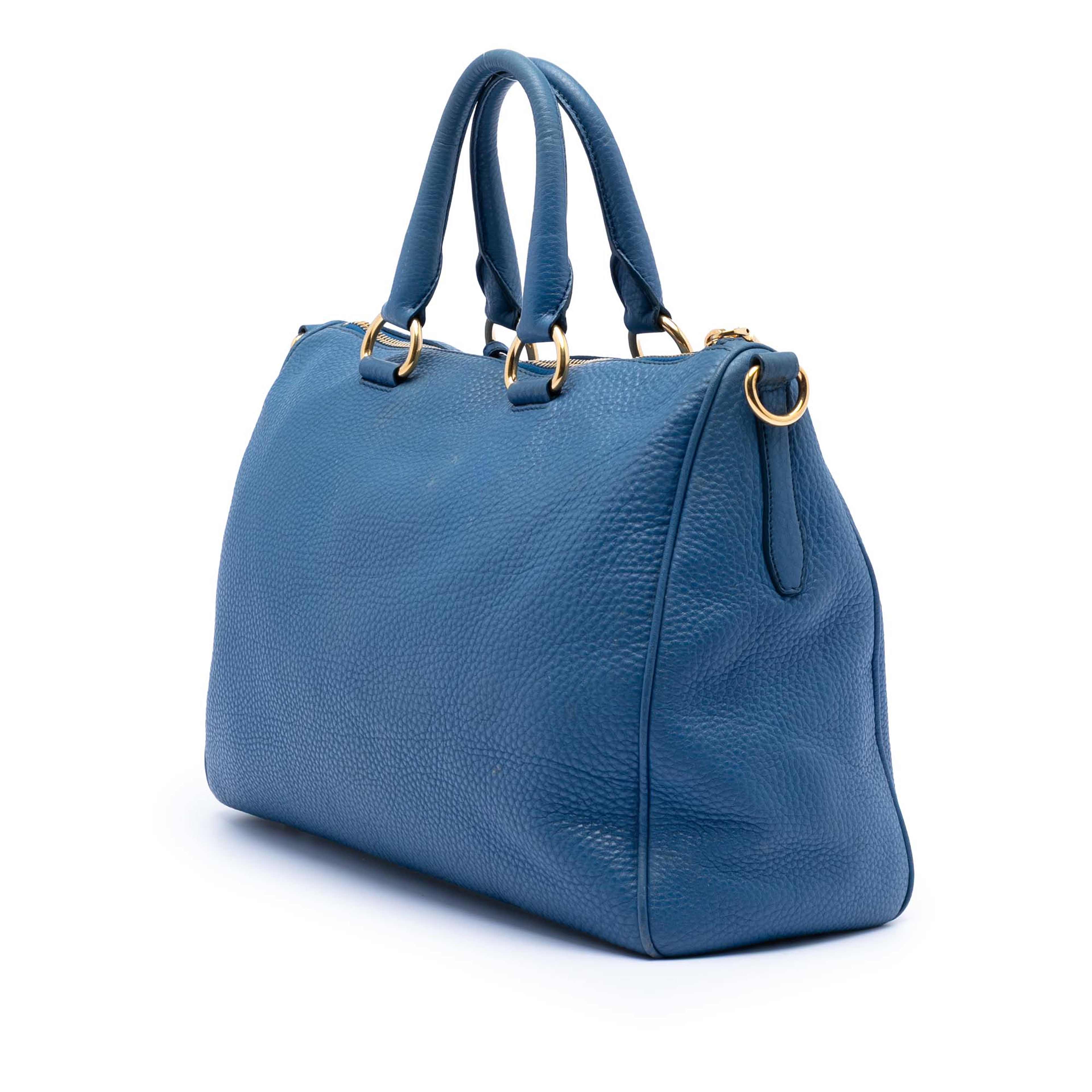 Prada Vitello Daino Zip Top Satchel, från Luxclusif, i färgen blå. Klicka för att öppna bilden i stort format