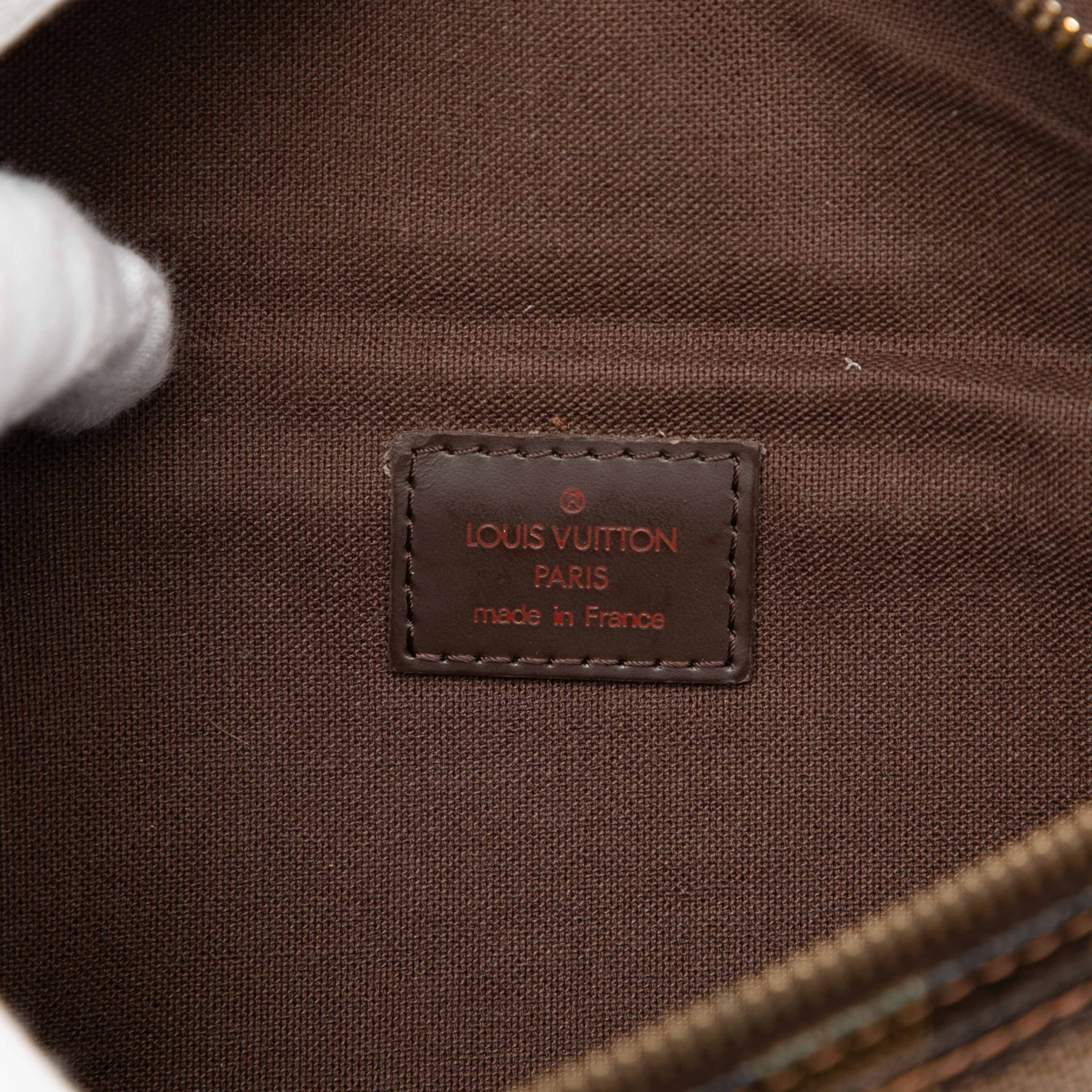 Louis Vuitton Damier Ebene Melville Bum Bag, från Luxclusif, i färgen brown. Klicka för att öppna bilden i stort format