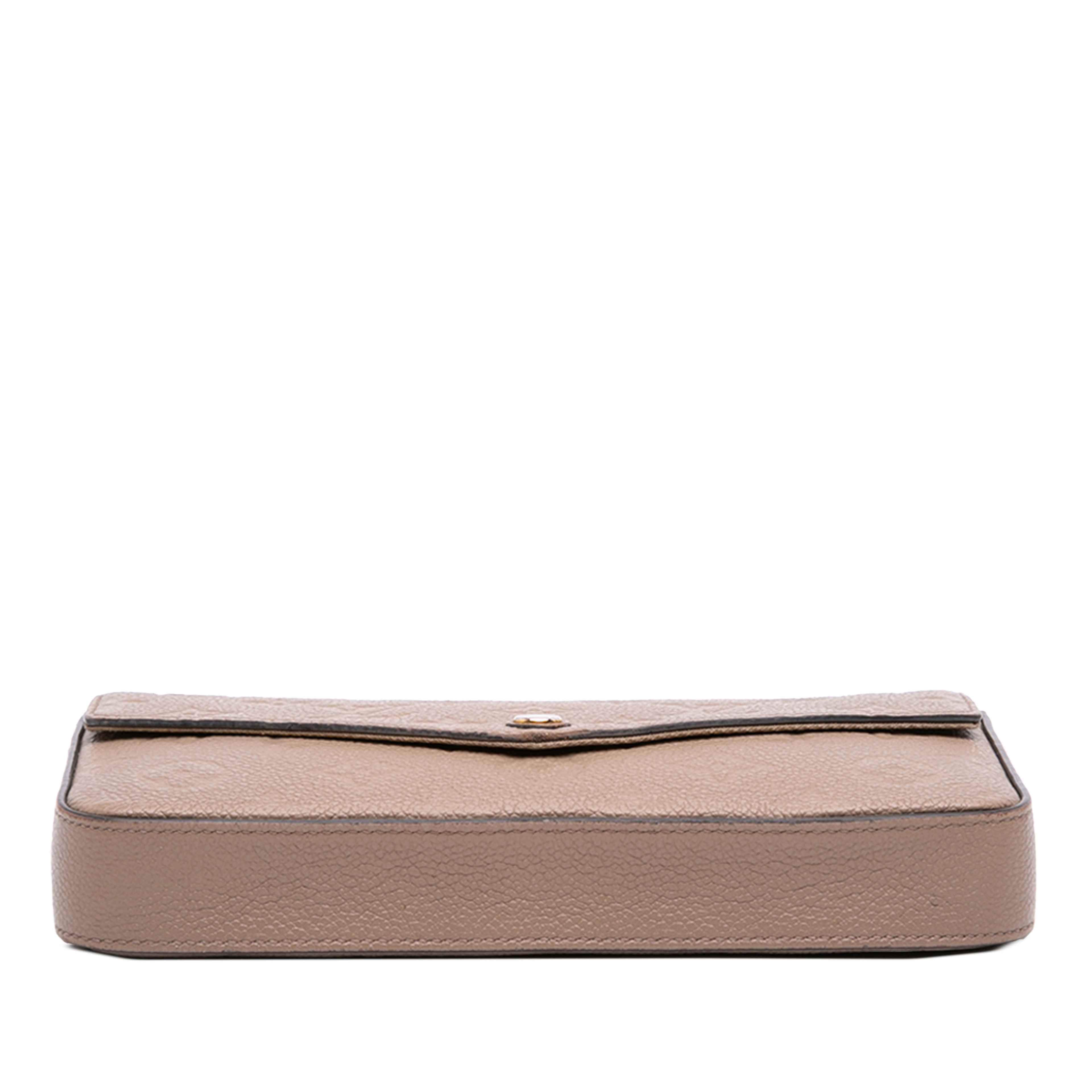 Louis Vuitton Monogram Empreinte Pochette Felicie, från Luxclusif, i färgen beige. Klicka för att öppna bilden i stort format