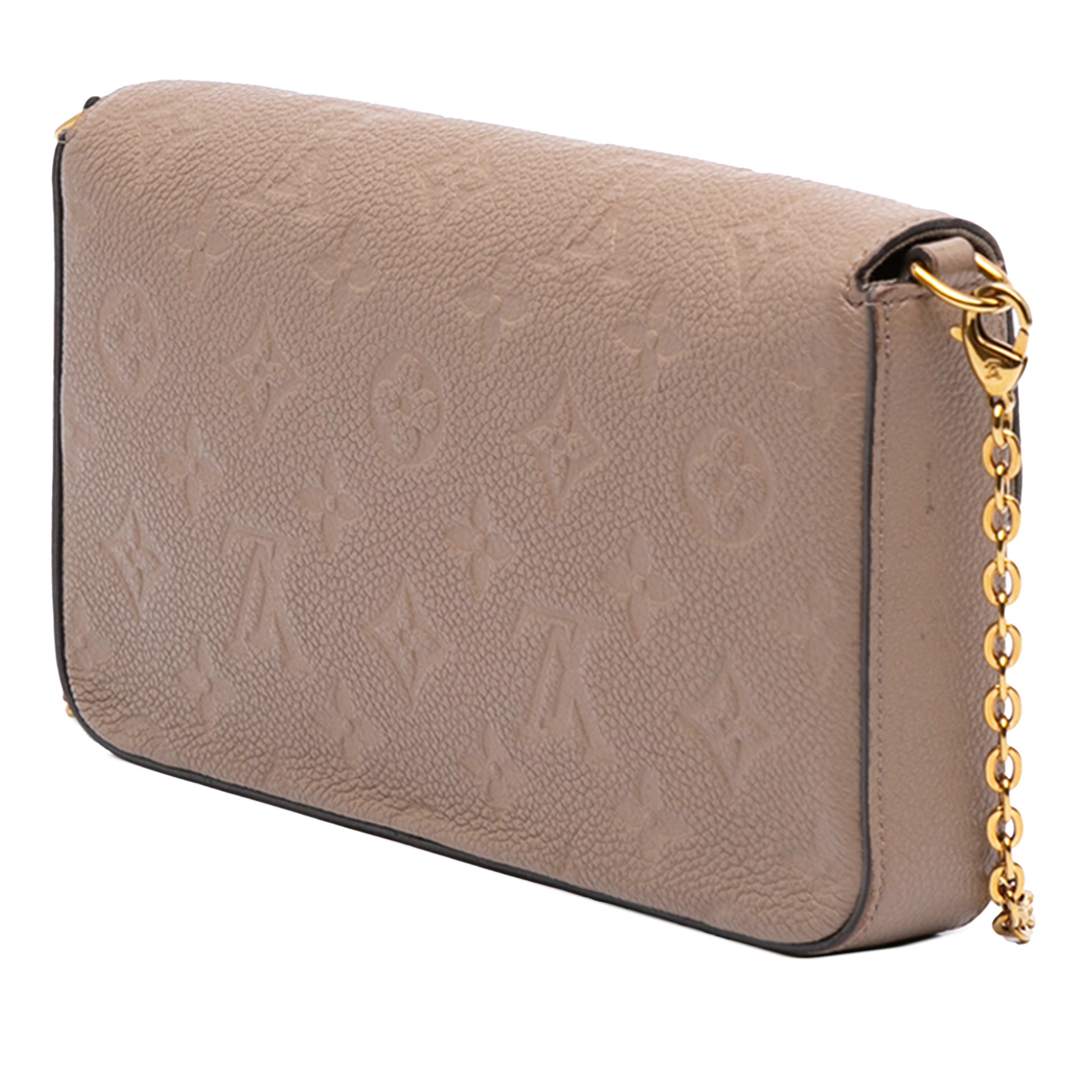 Louis Vuitton Monogram Empreinte Pochette Felicie, från Luxclusif, i färgen beige. Klicka för att öppna bilden i stort format
