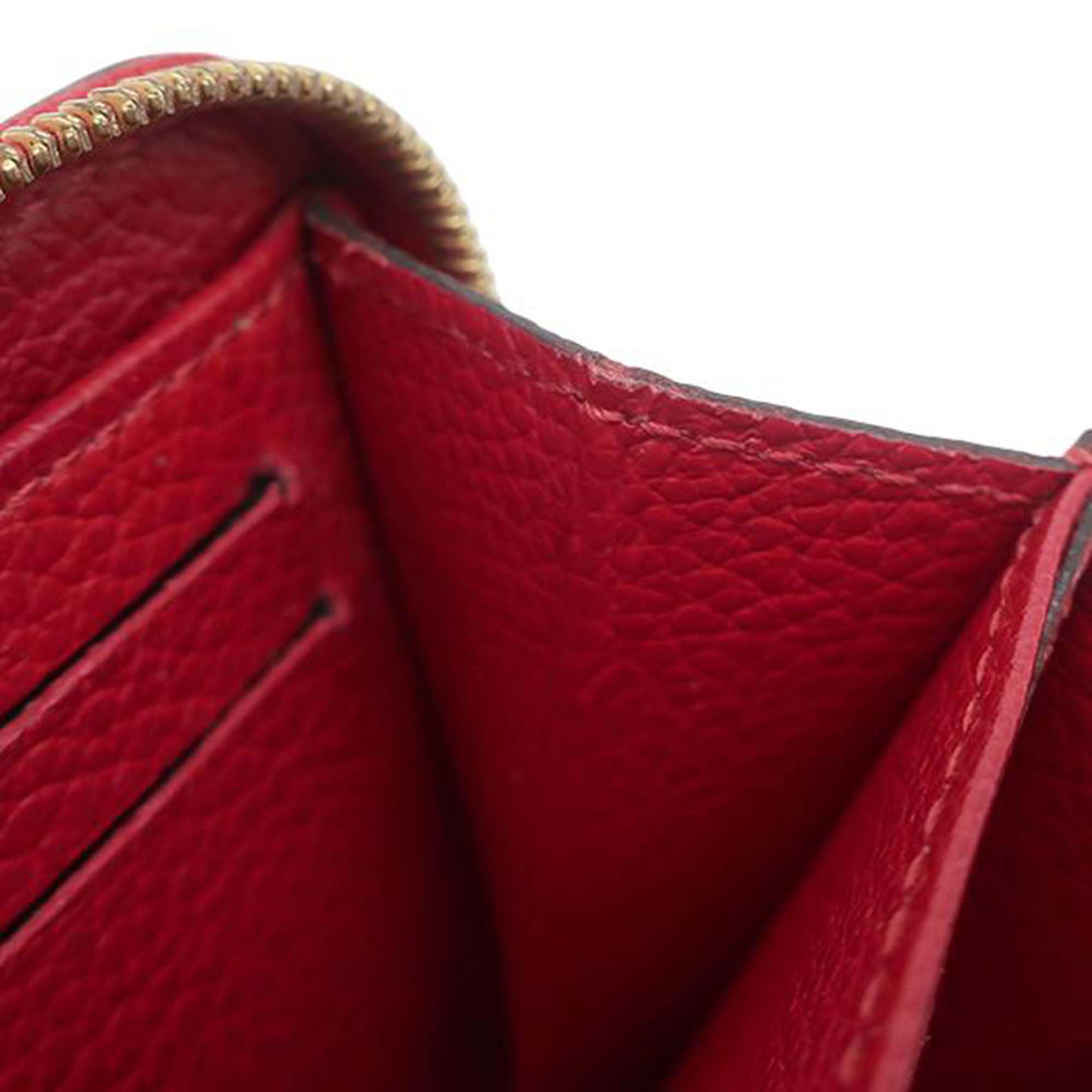 Louis Vuitton Monogram Empreinte Zippy Coin Purse, från Luxclusif, i färgen red. Klicka för att öppna bilden i stort format
