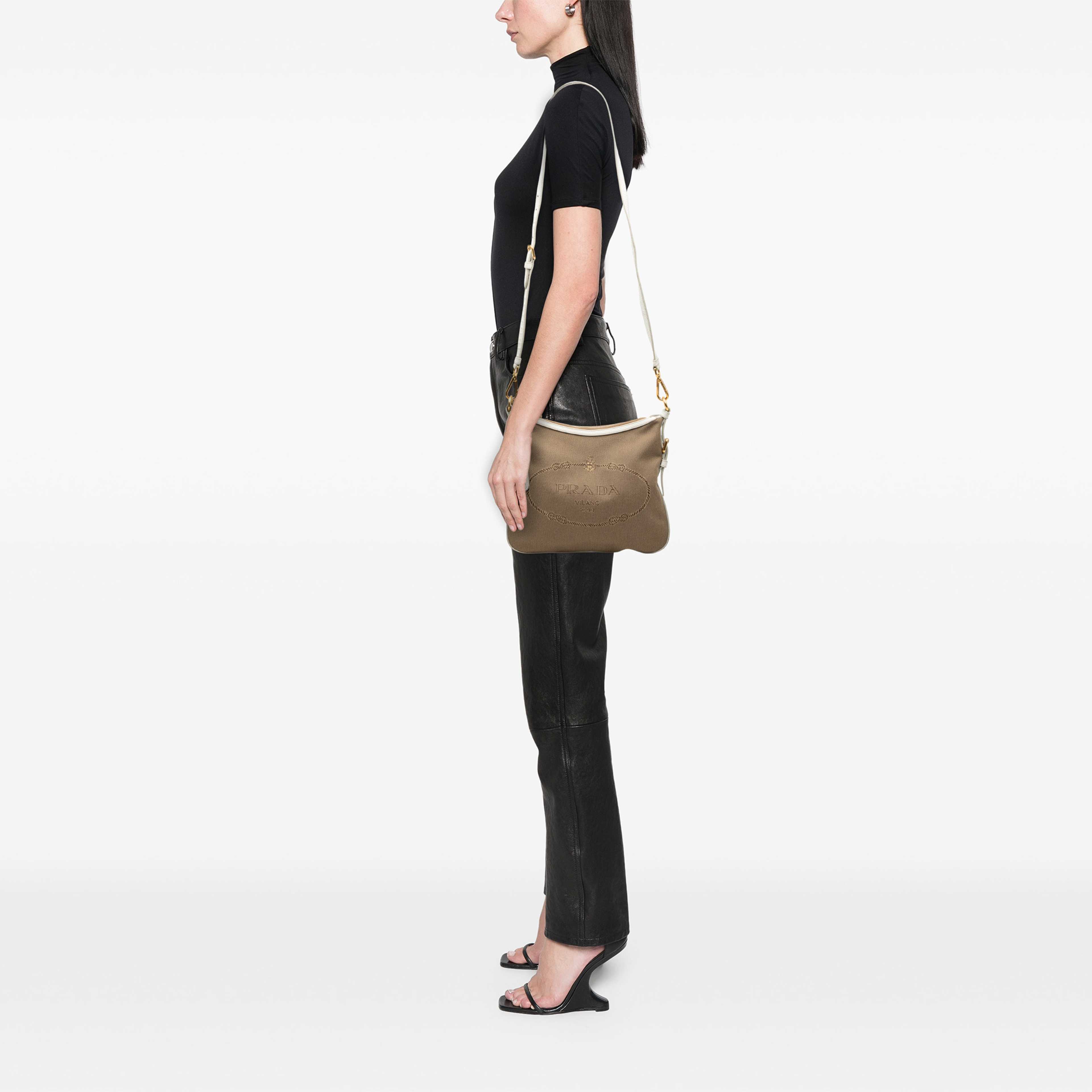 Prada Canvas Canapa Logo Crossbody, från Luxclusif, i färgen vit. Klicka för att öppna bilden i stort format