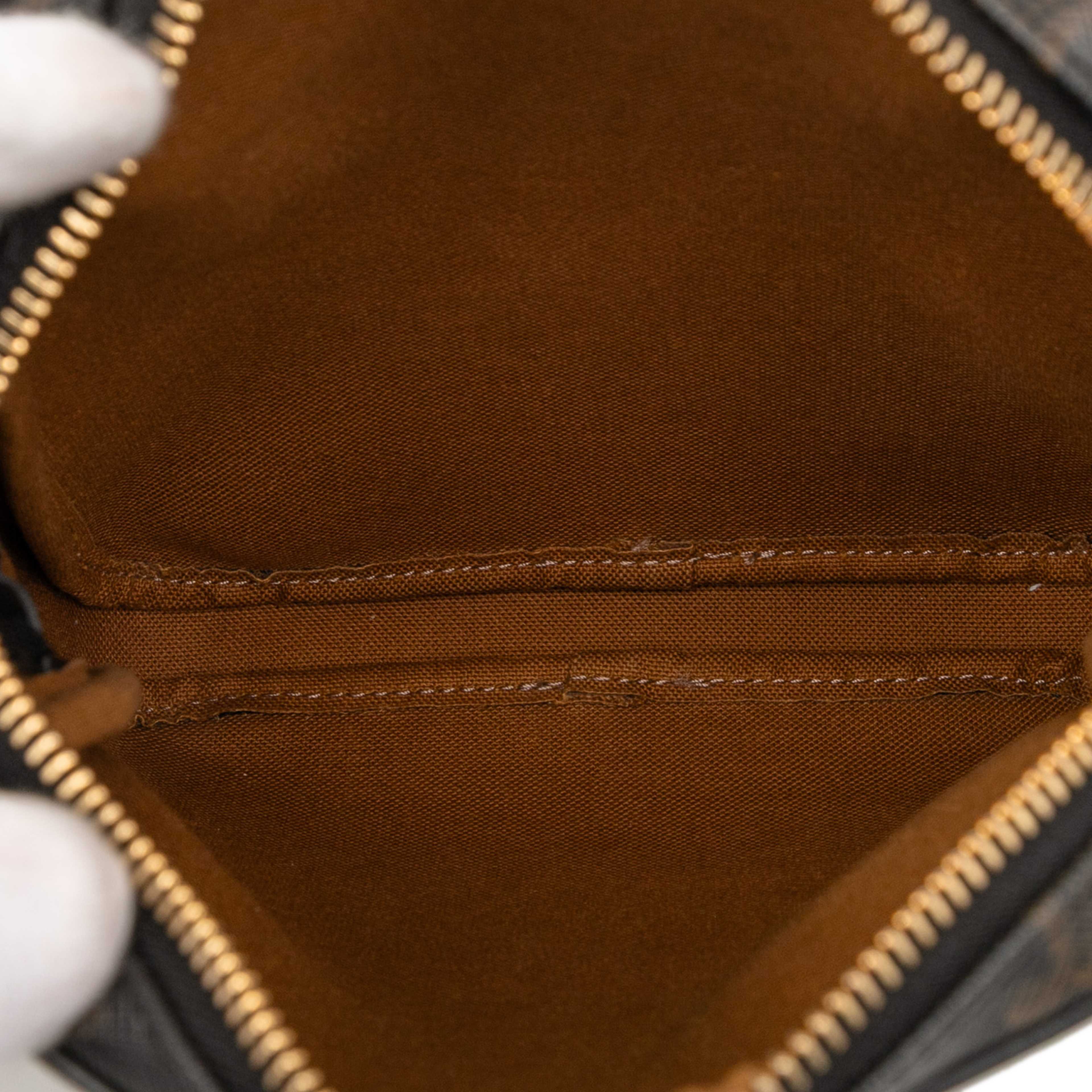 Celine Triomphe Coated Canvas Vertical Crossbody, från Luxclusif, i färgen dark brown. Klicka för att öppna bilden i stort format