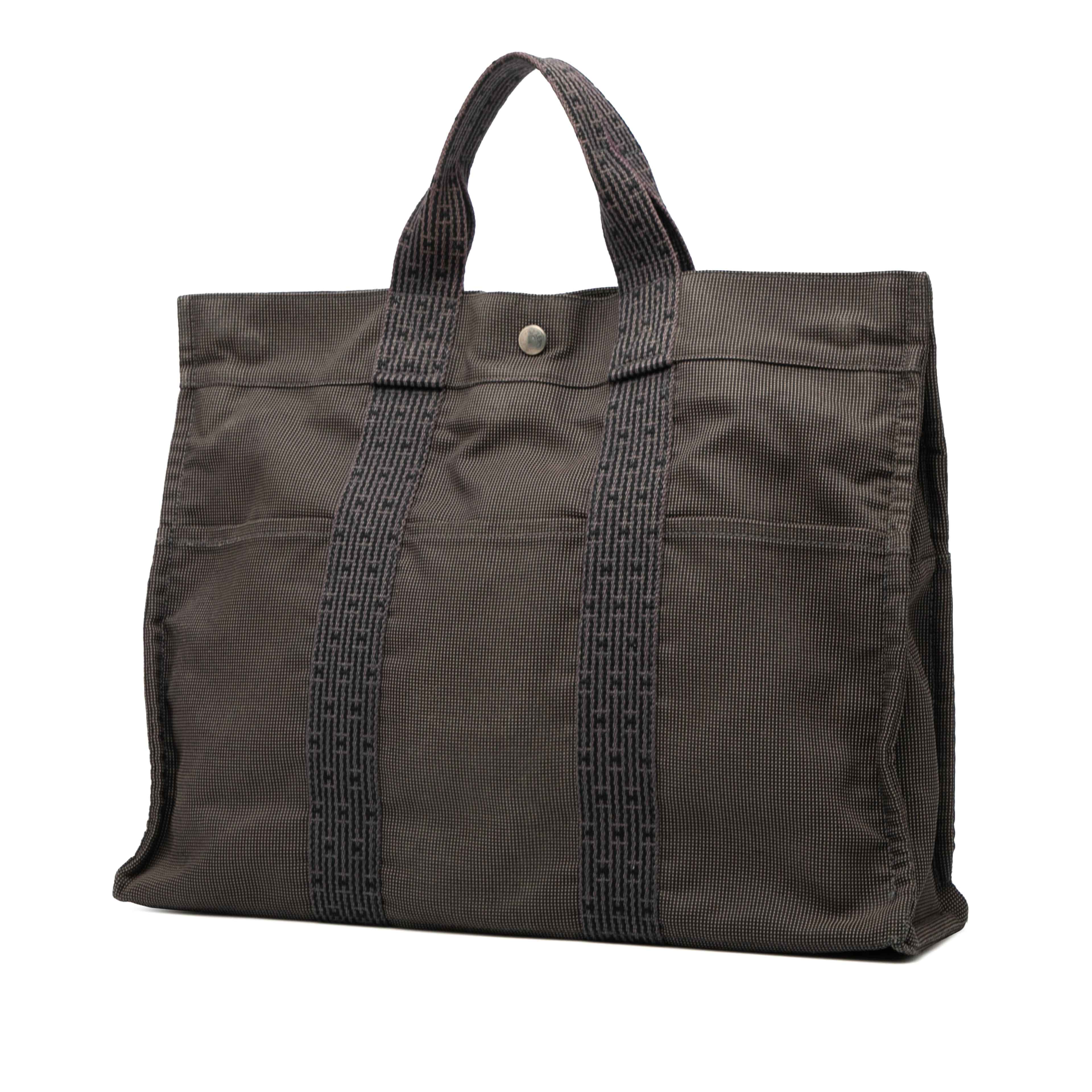 Hermès Canvas Herline Mm, från Luxclusif, i färgen dark gray. Klicka för att öppna bilden i stort format