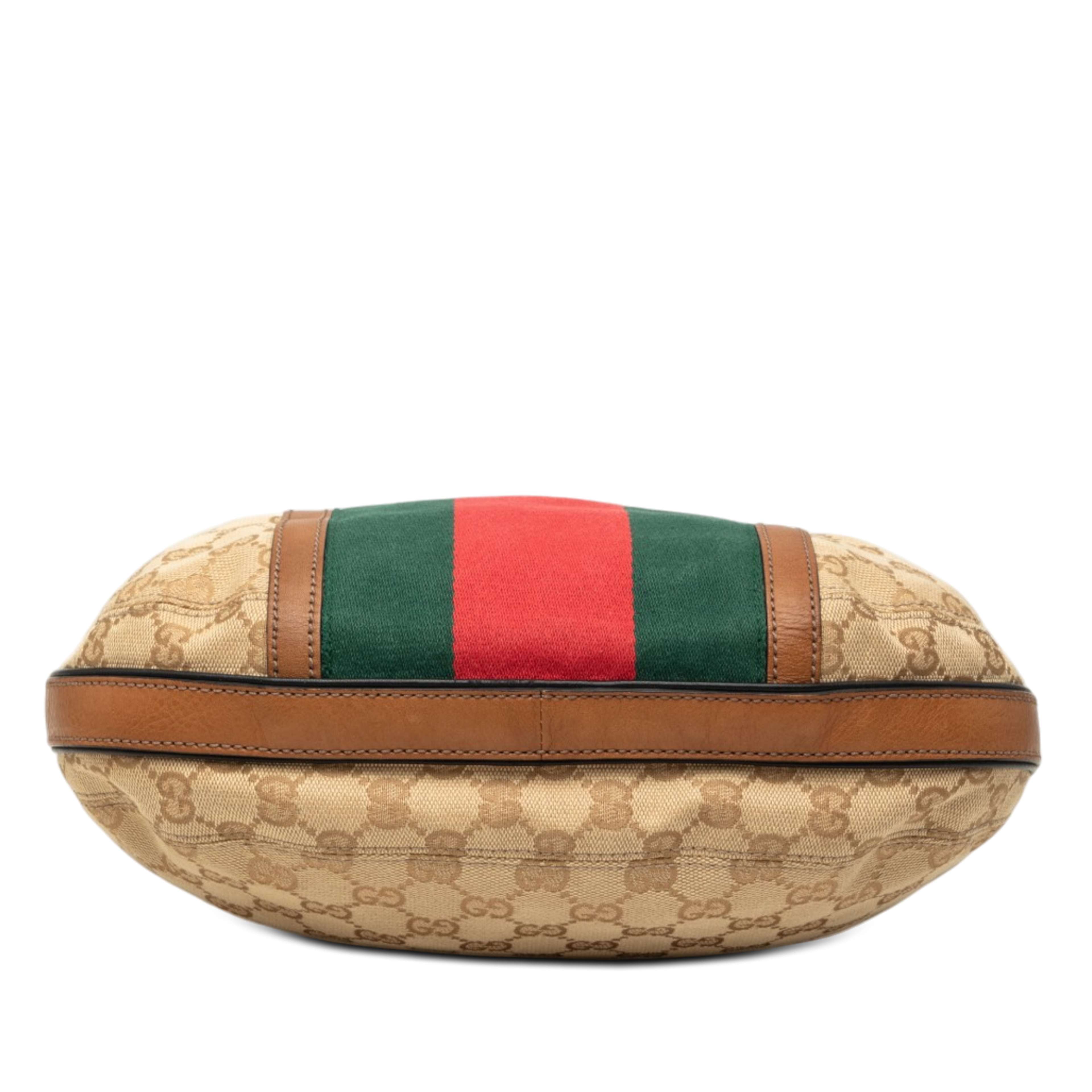 Gucci Gg Canvas Web Rania Drawstring Hobo, från Luxclusif, i färgen beige. Klicka för att öppna bilden i stort format