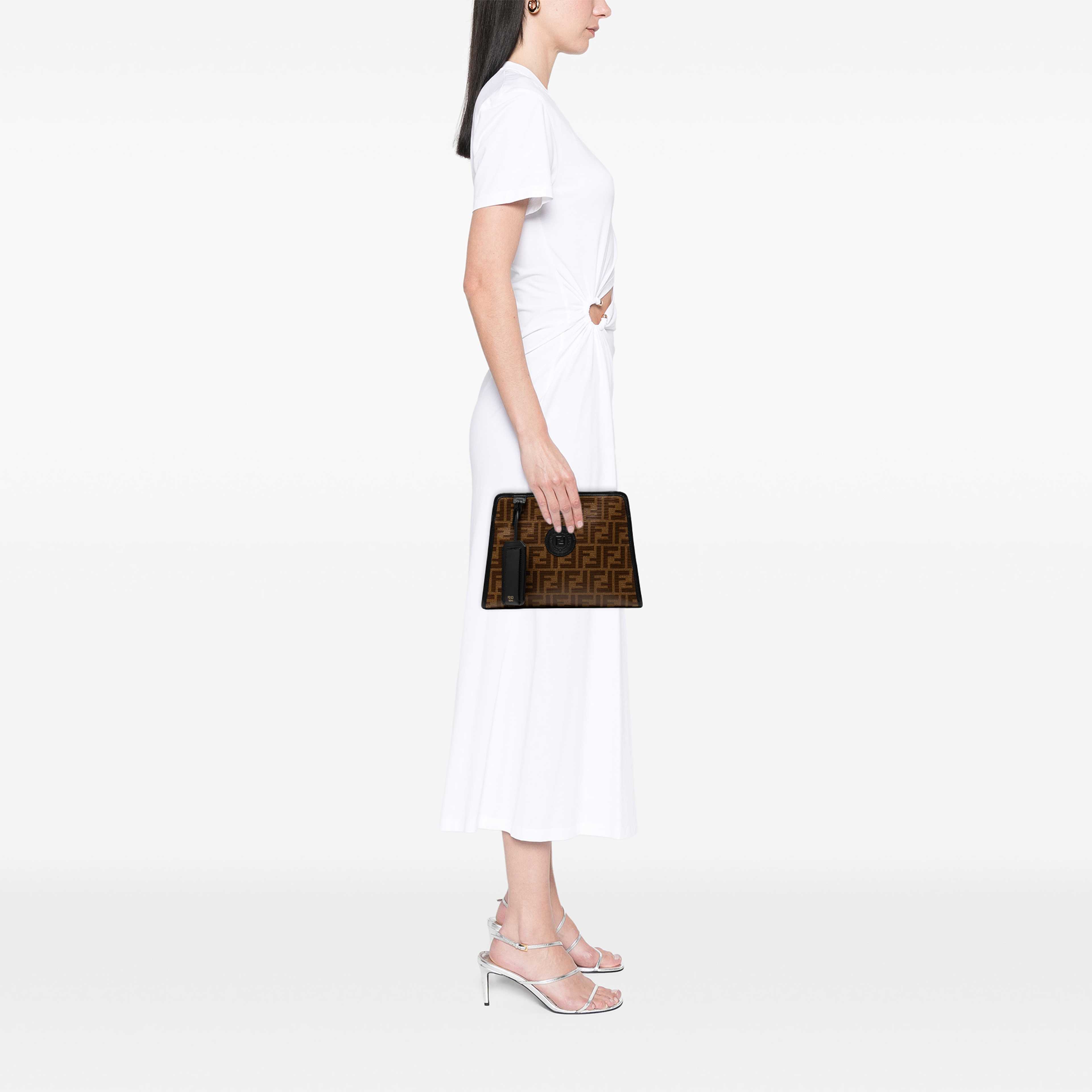 Fendi Small Zucca Coated Canvas Peekaboo Defender, från Luxclusif, i färgen brun. Klicka för att öppna bilden i stort format