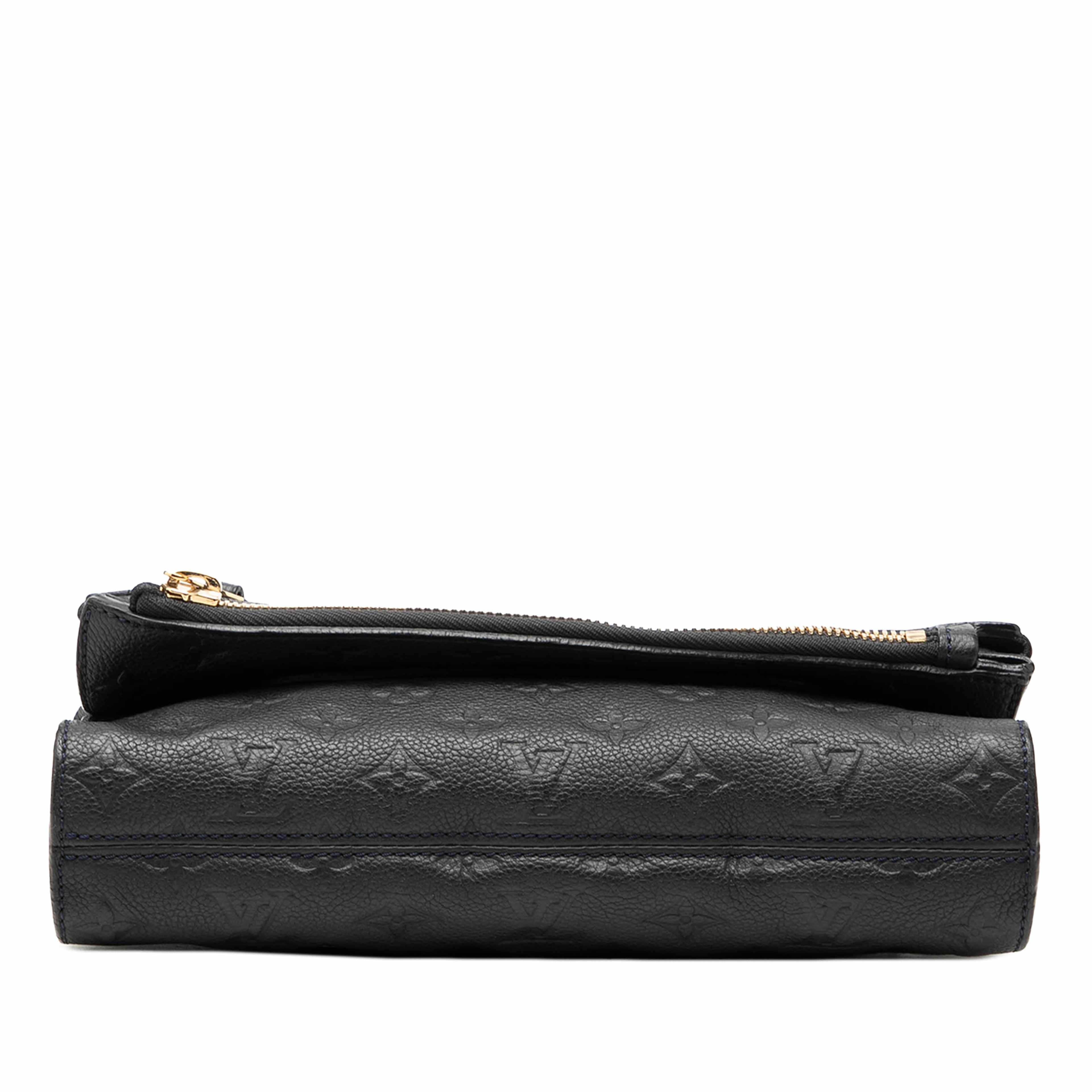 Louis Vuitton Monogram Empreinte Petillante, från Luxclusif, i färgen blå. Klicka för att öppna bilden i stort format