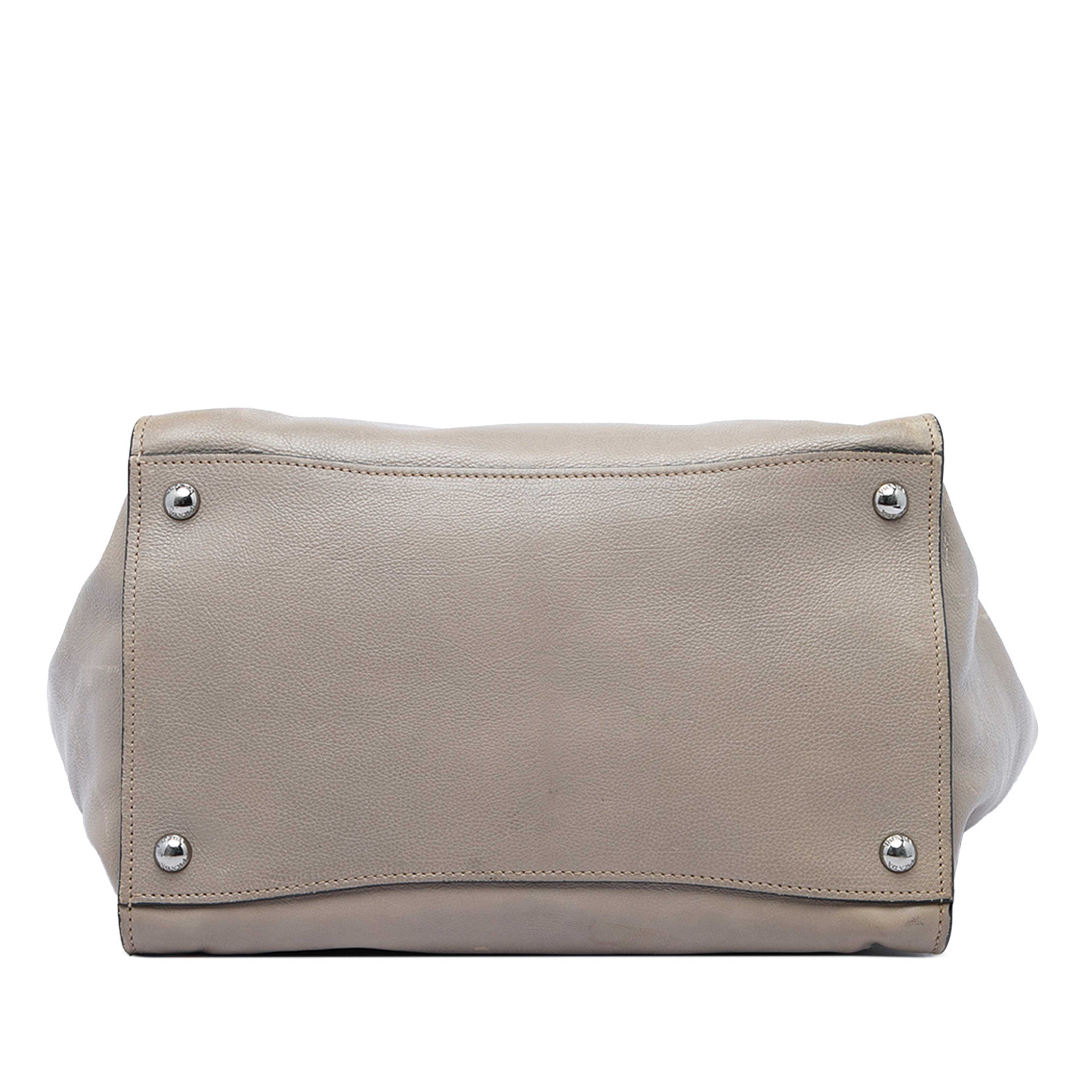Prada Glace Calf Twin Pocket Double Handle Satchel, från Luxclusif, i färgen brun. Klicka för att öppna bilden i stort format