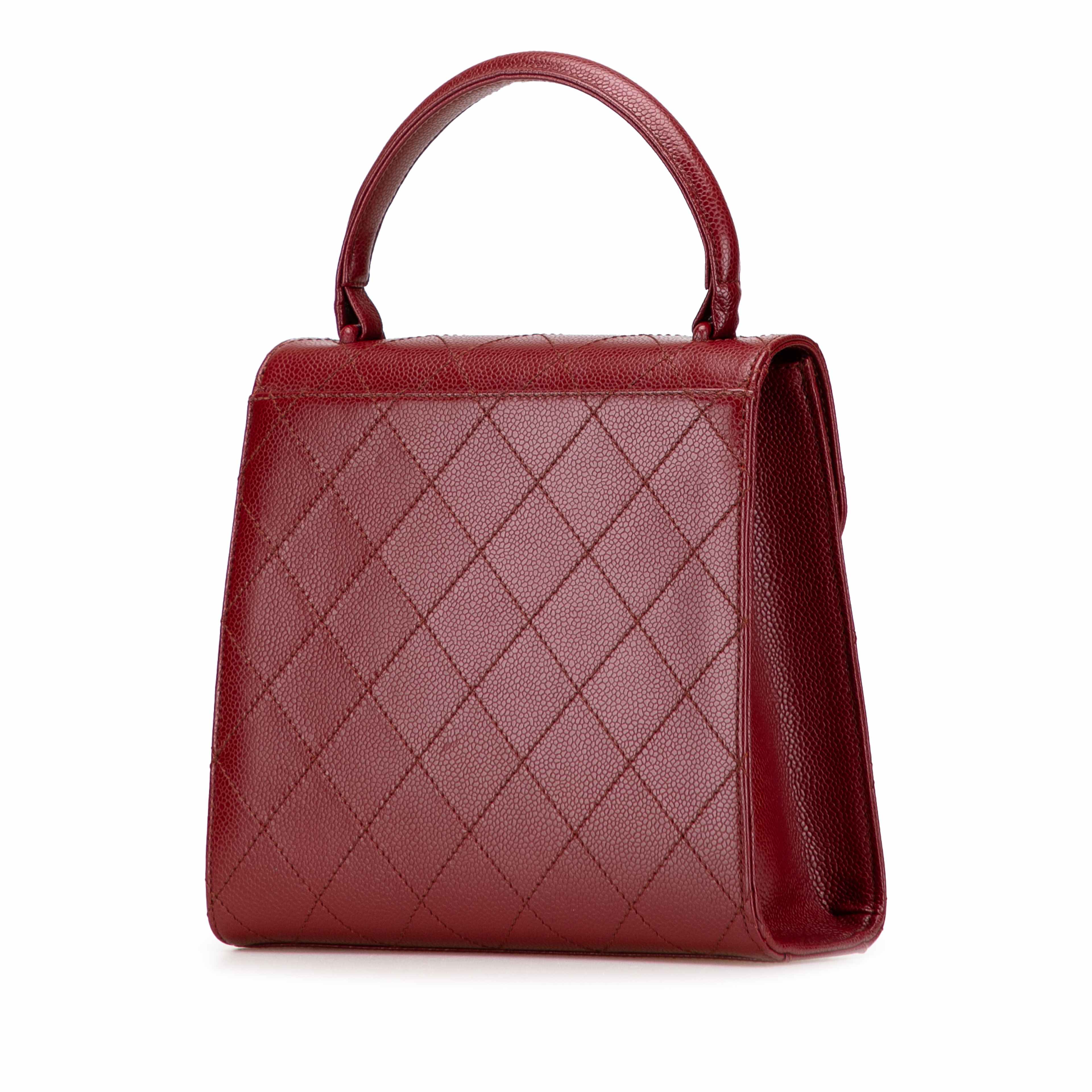 Chanel Reissue 2.55 Quilted Caviar Top Handle Flap, från Luxclusif, i färgen dark red. Klicka för att öppna bilden i stort format