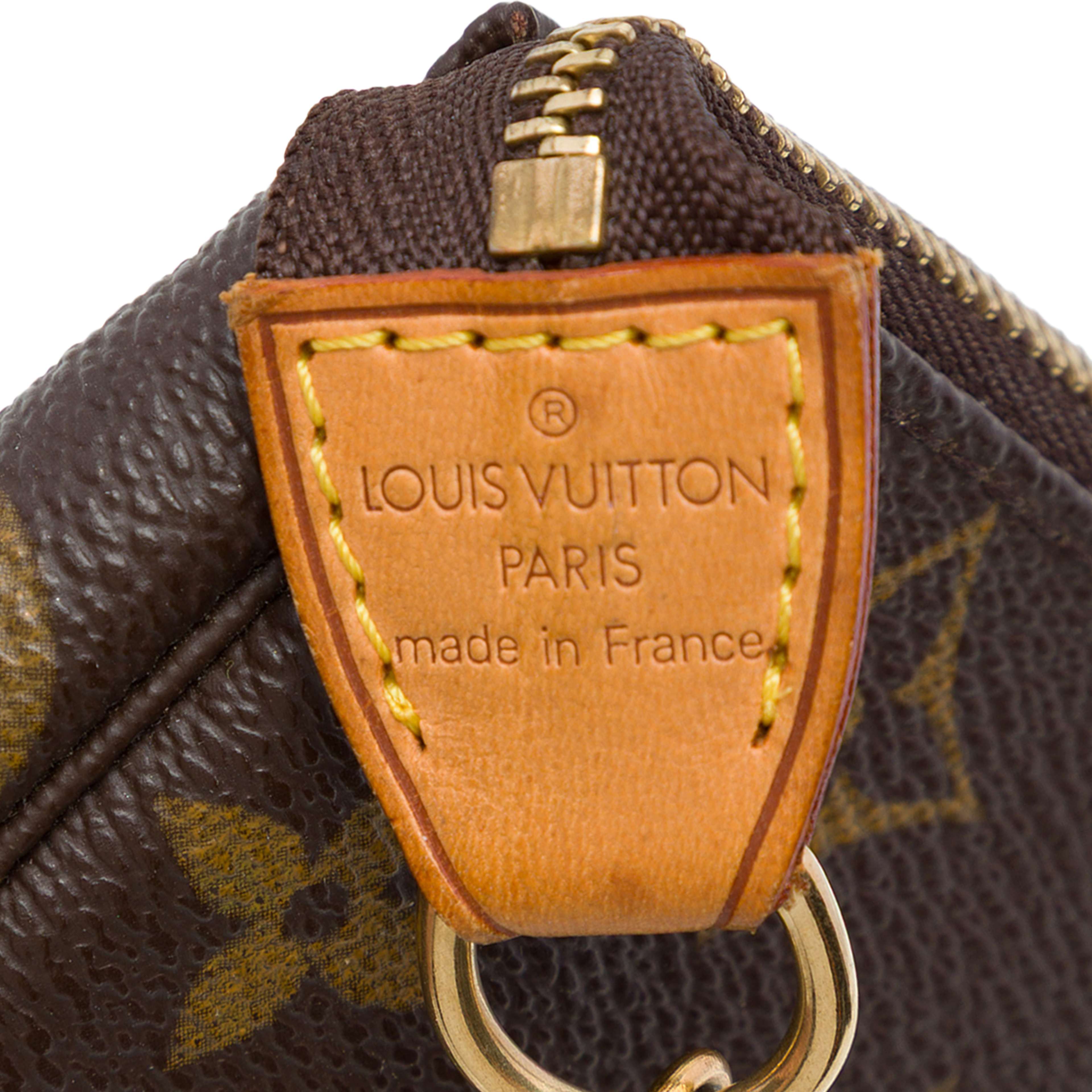 Louis Vuitton Monogram Mini Pochette Accessoires, från Luxclusif, i färgen brun. Klicka för att öppna bilden i stort format