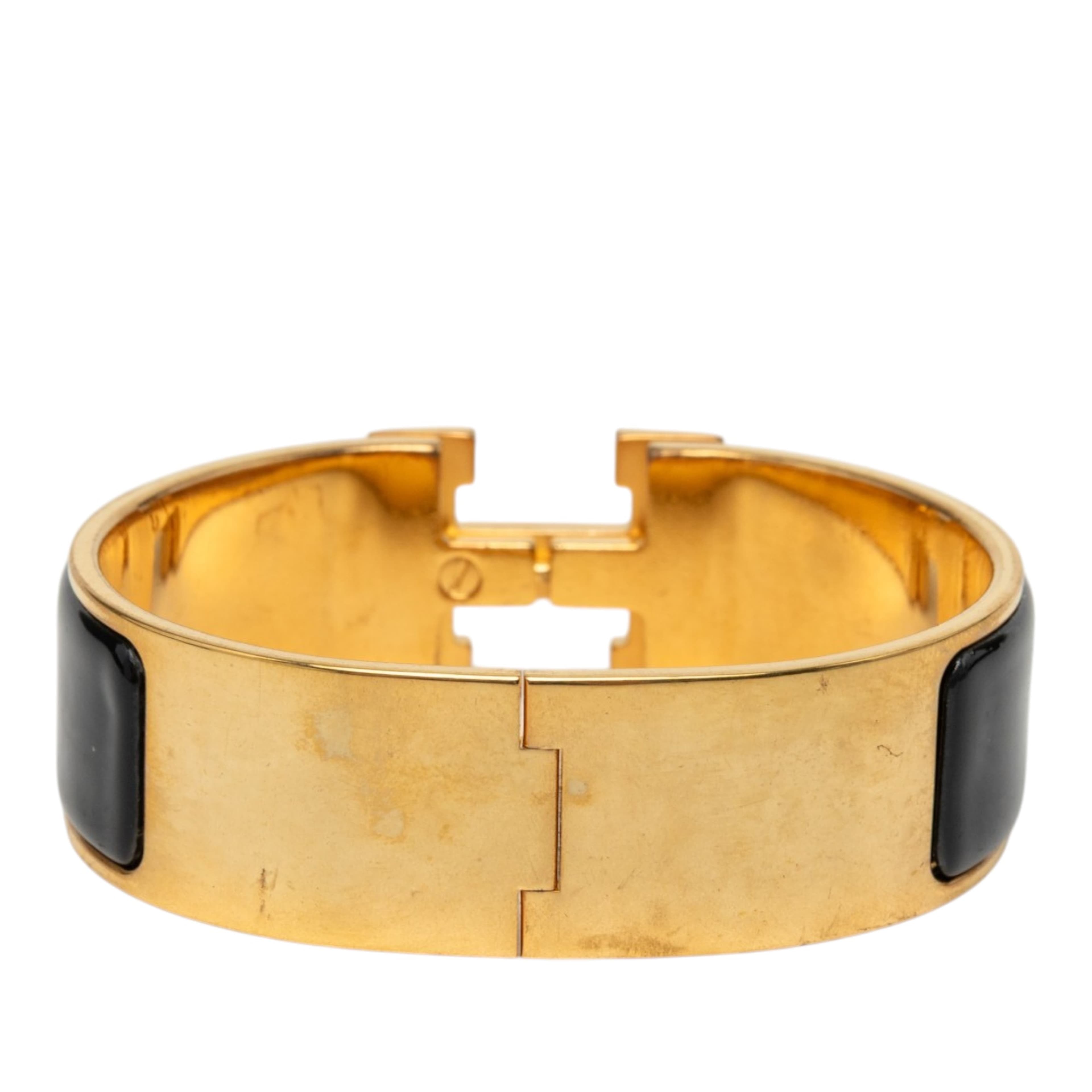 Hermès Wide Enamel Clic Clac H Bracelet Pm, från Luxclusif, i färgen svart. Klicka för att öppna bilden i stort format
