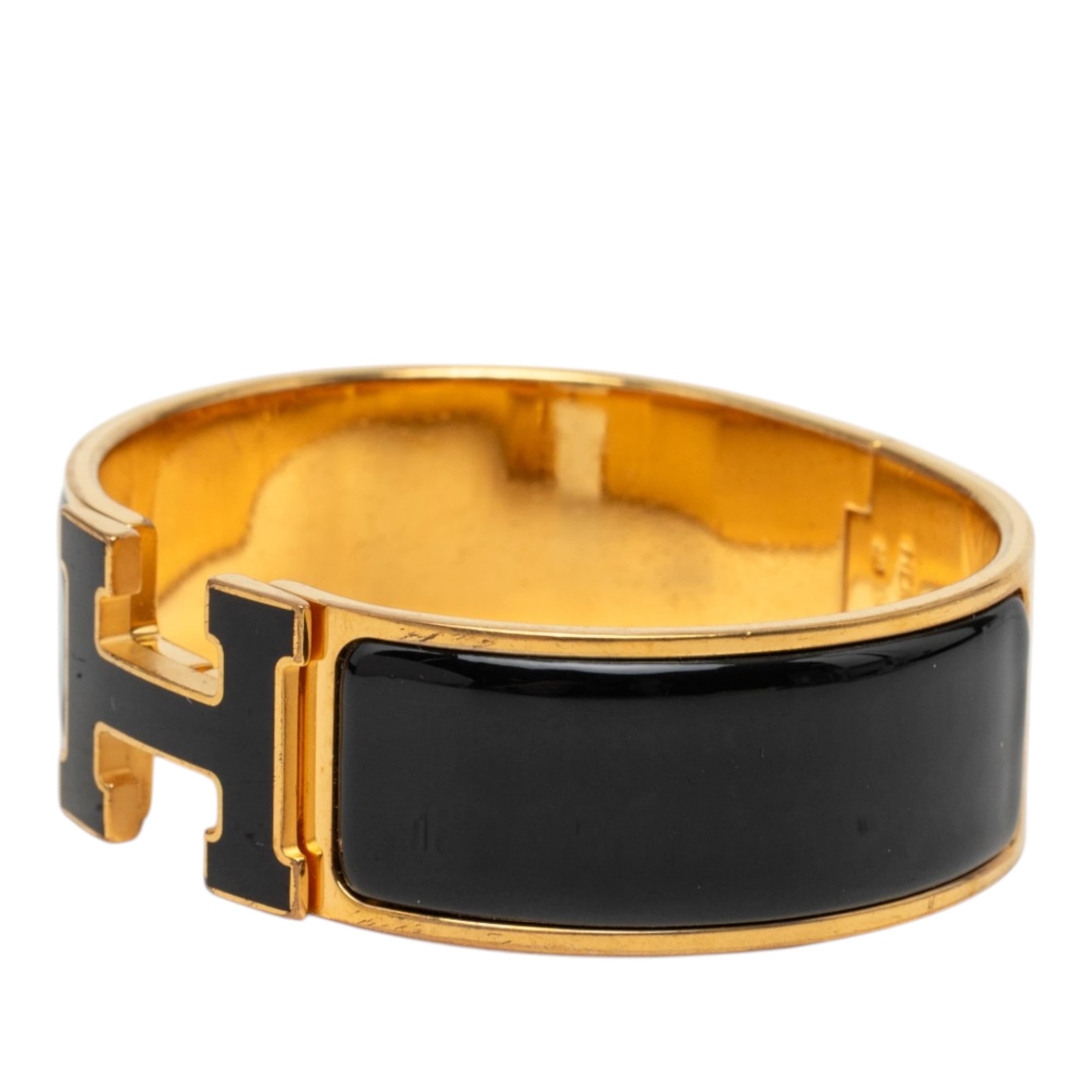 Hermès Wide Enamel Clic Clac H Bracelet Pm, från Luxclusif, i färgen svart. Klicka för att öppna bilden i stort format