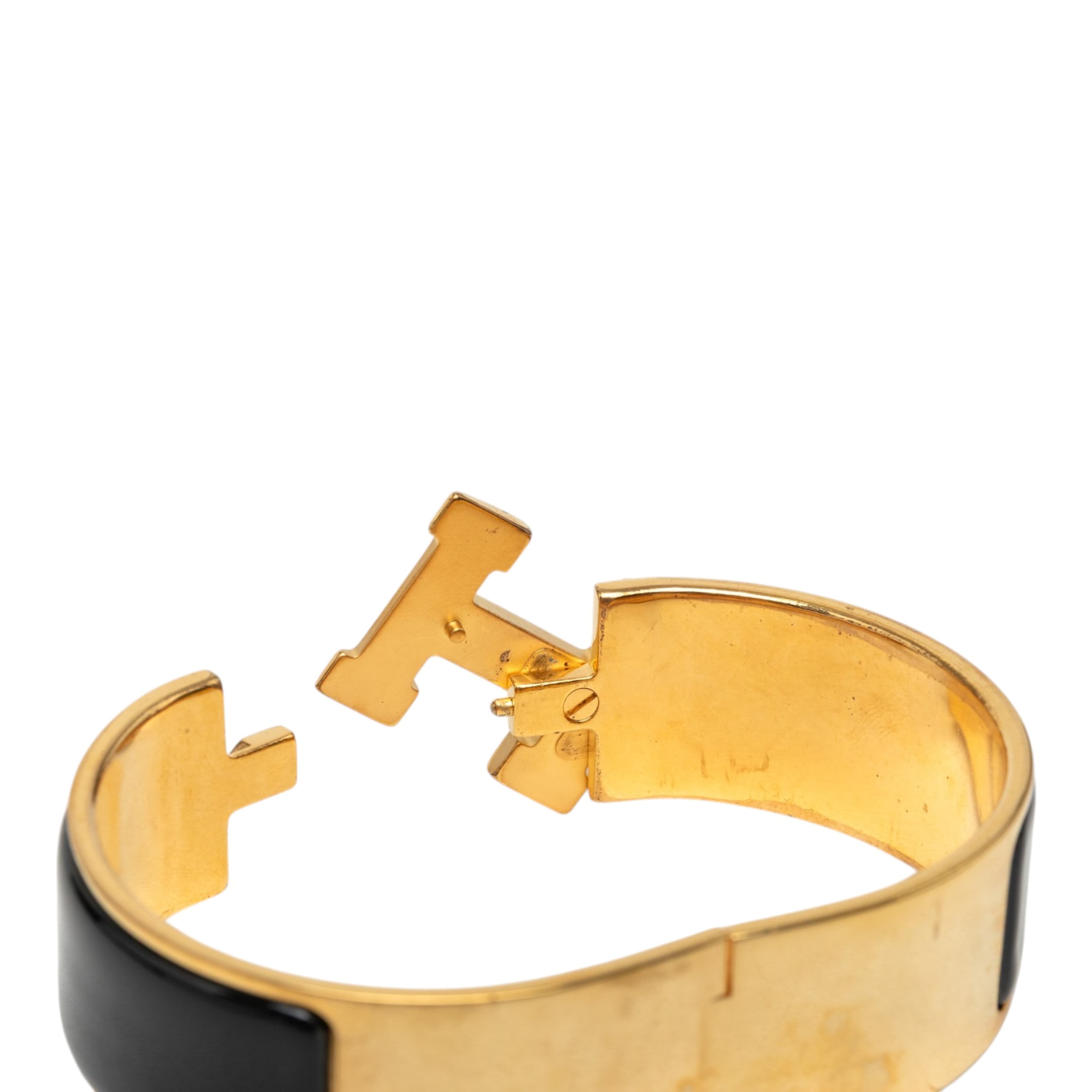 Hermès Wide Enamel Clic Clac H Bracelet Pm, från Luxclusif, i färgen svart. Klicka för att öppna bilden i stort format