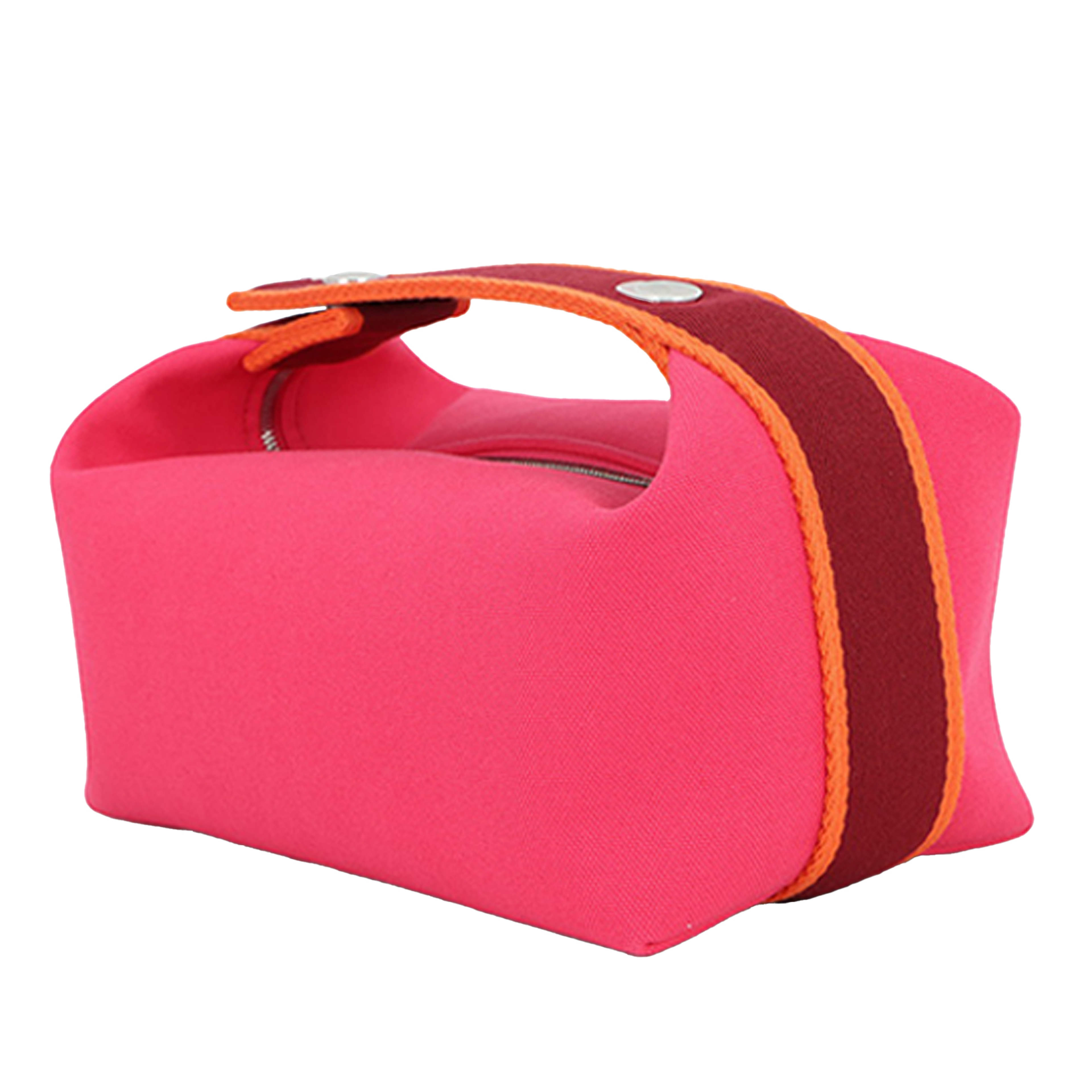 Hermès Small Toile Bride A Brac Case, från Luxclusif, i färgen rosa. Klicka för att öppna bilden i stort format