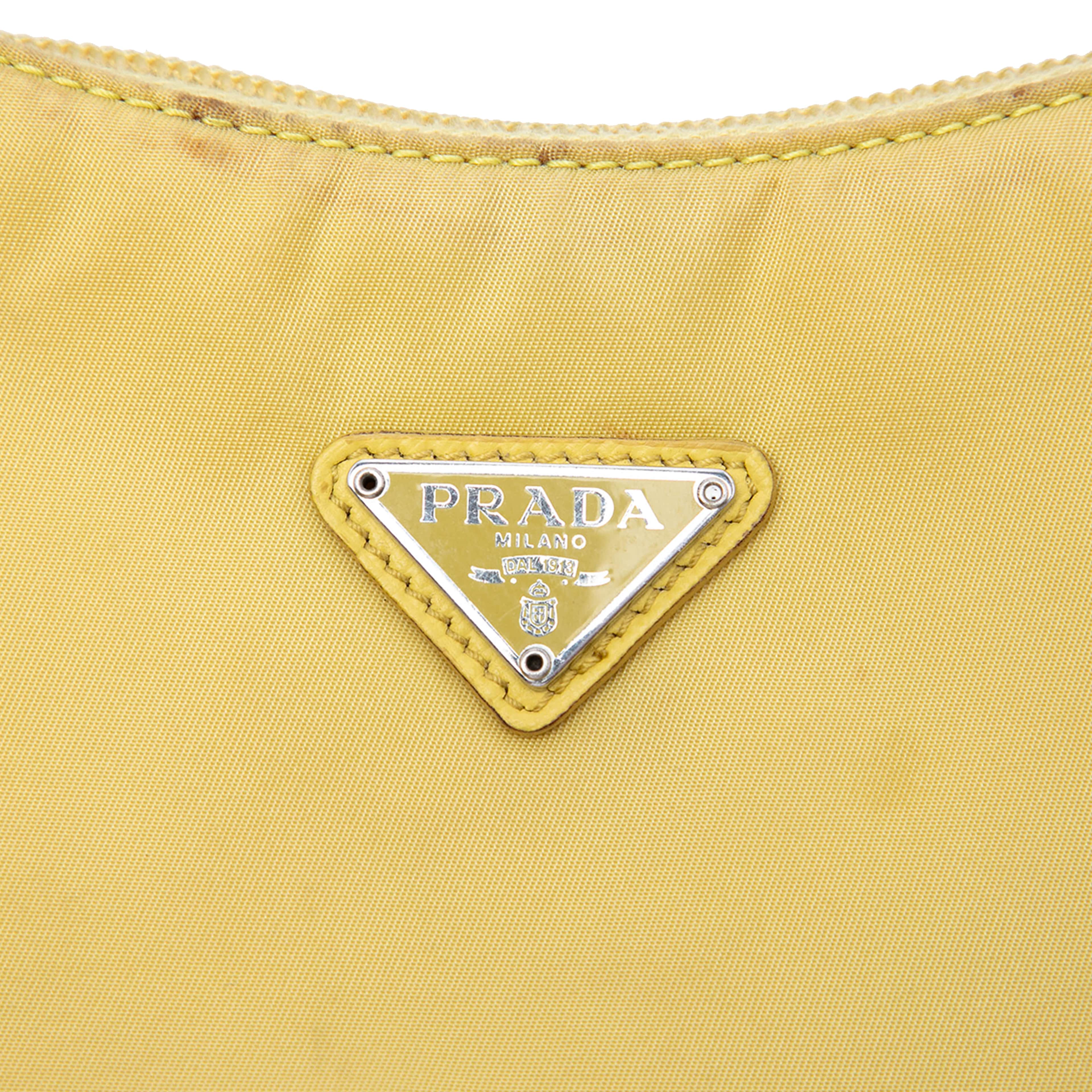 Prada Mini Tessuto Re Edition 2000 Shoulder Bag, från Luxclusif, i färgen gul. Klicka för att öppna bilden i stort format