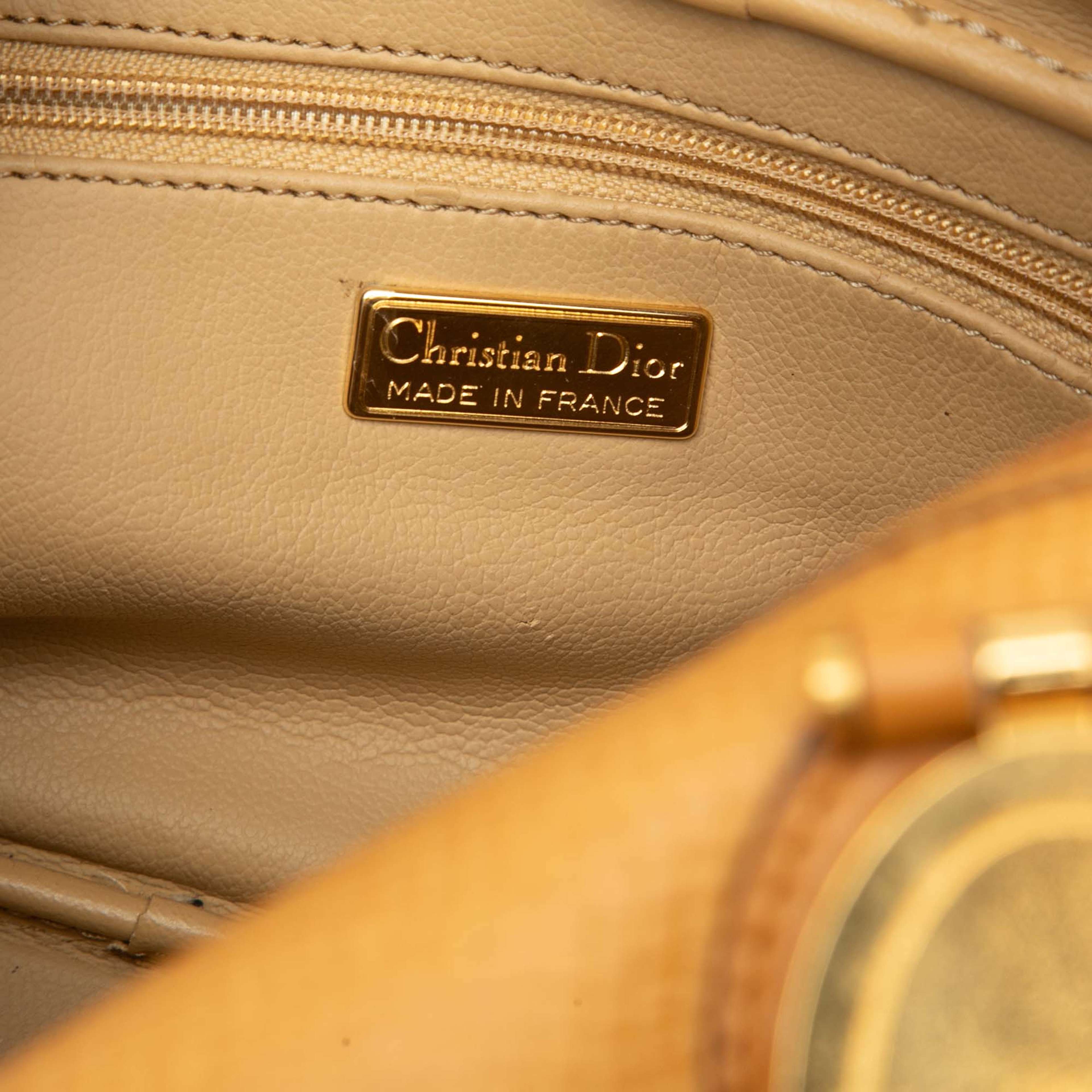 Dior Leather Top Handle Bag, från Luxclusif, i färgen gul. Klicka för att öppna bilden i stort format