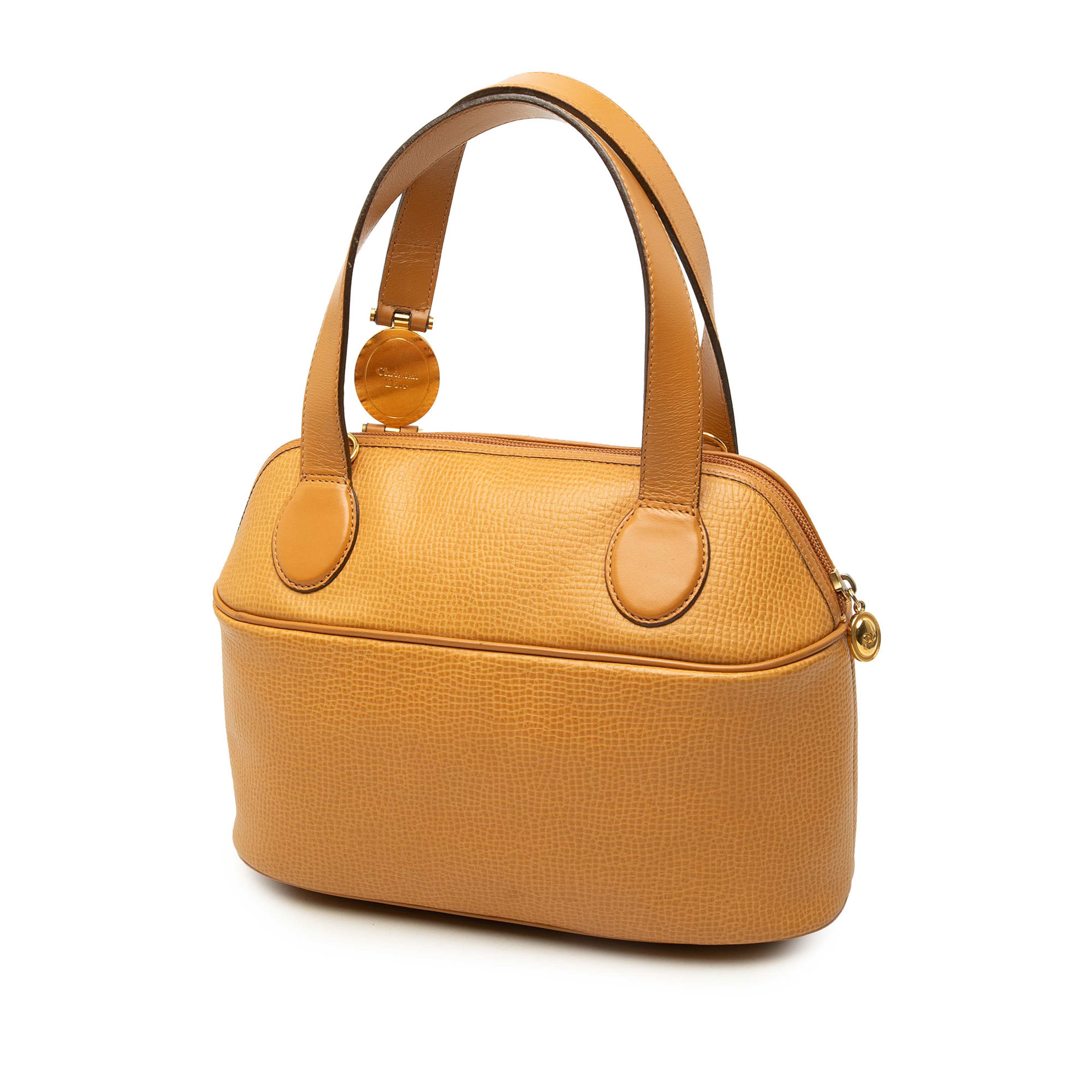 Dior Leather Top Handle Bag, från Luxclusif, i färgen gul. Klicka för att öppna bilden i stort format