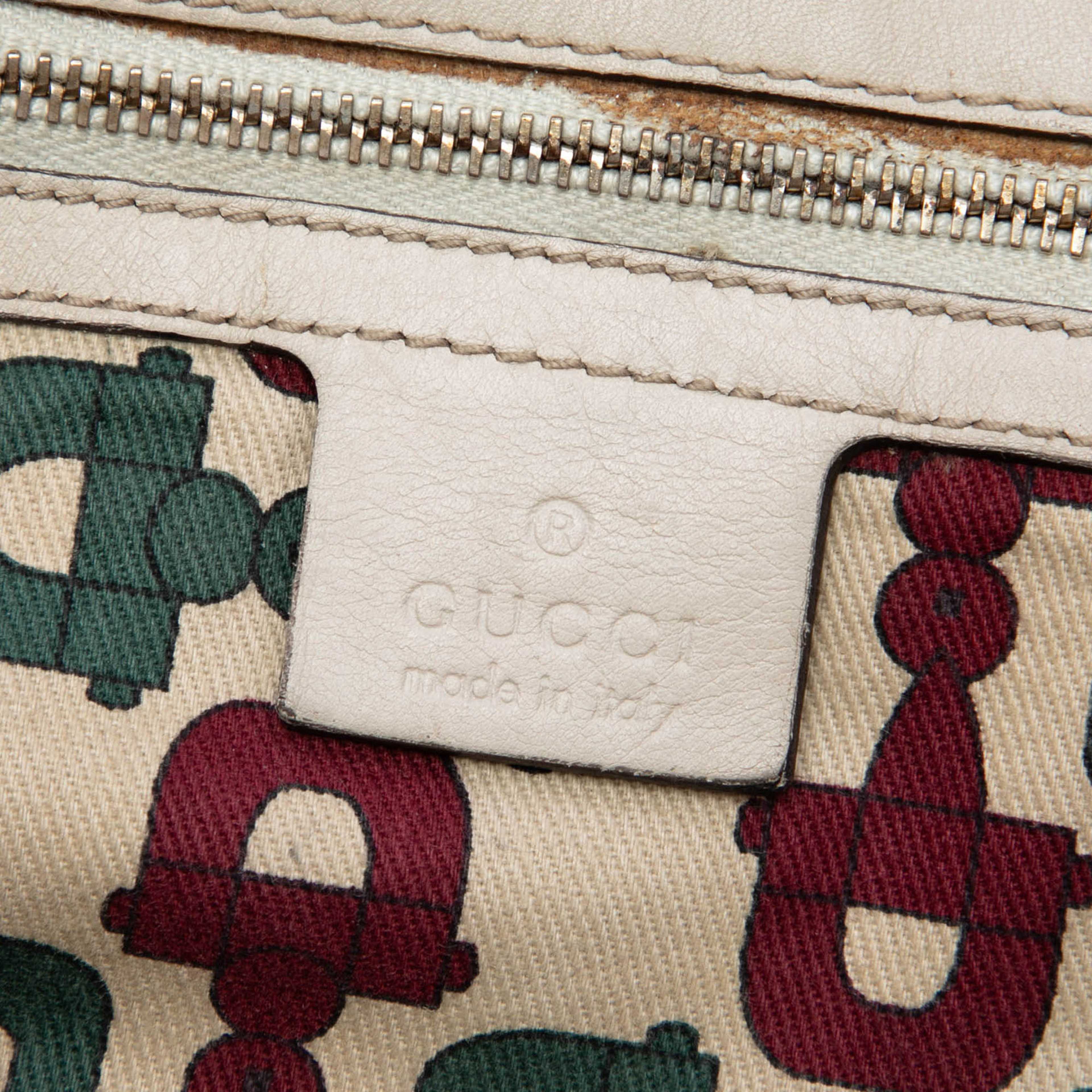 Gucci Medium Guccissima Positano Tote, från Luxclusif, i färgen vit. Klicka för att öppna bilden i stort format