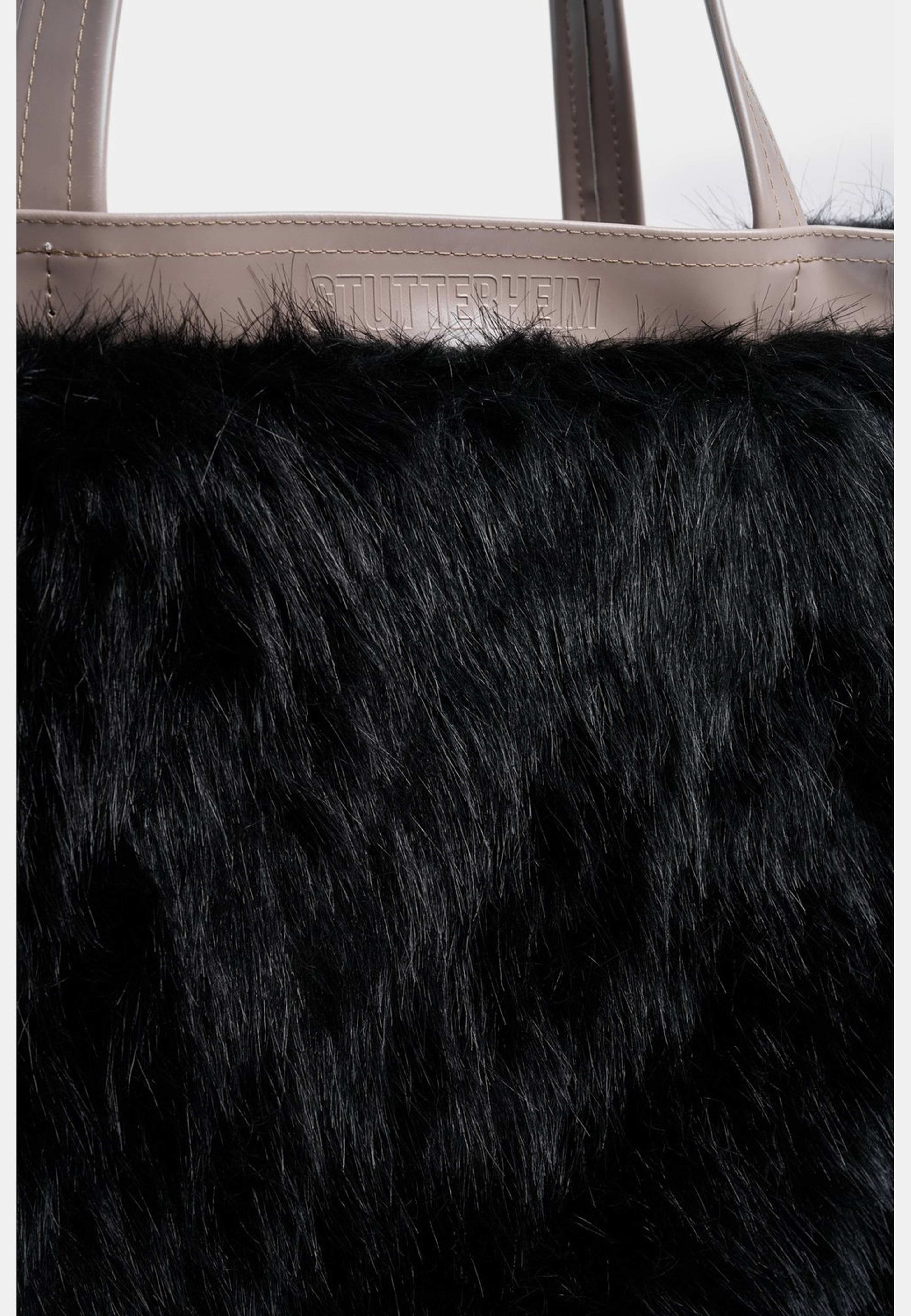 Stylist Faux Bag, från Stutterheim, i färgen potato opal. Klicka för att öppna bilden i stort format