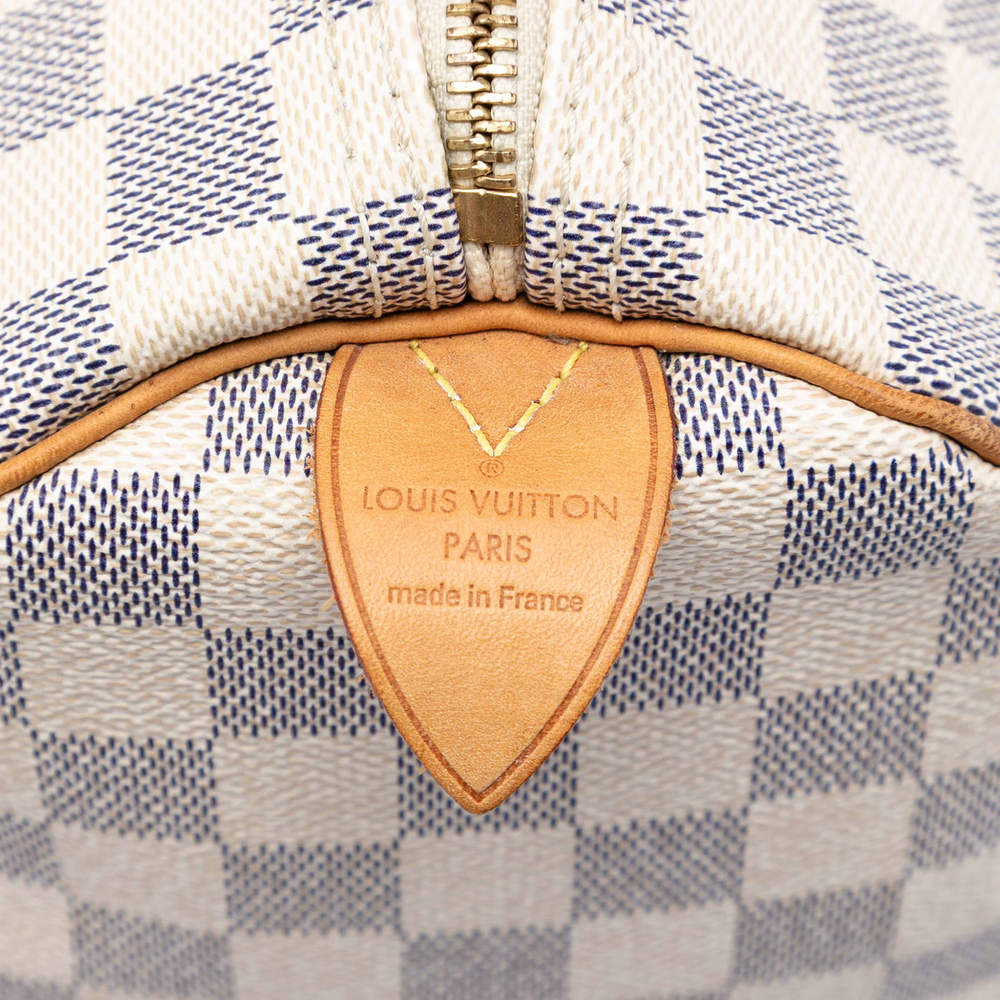 Louis Vuitton Damier Azur Speedy 30, från Luxclusif, i färgen white. Klicka för att öppna bilden i stort format