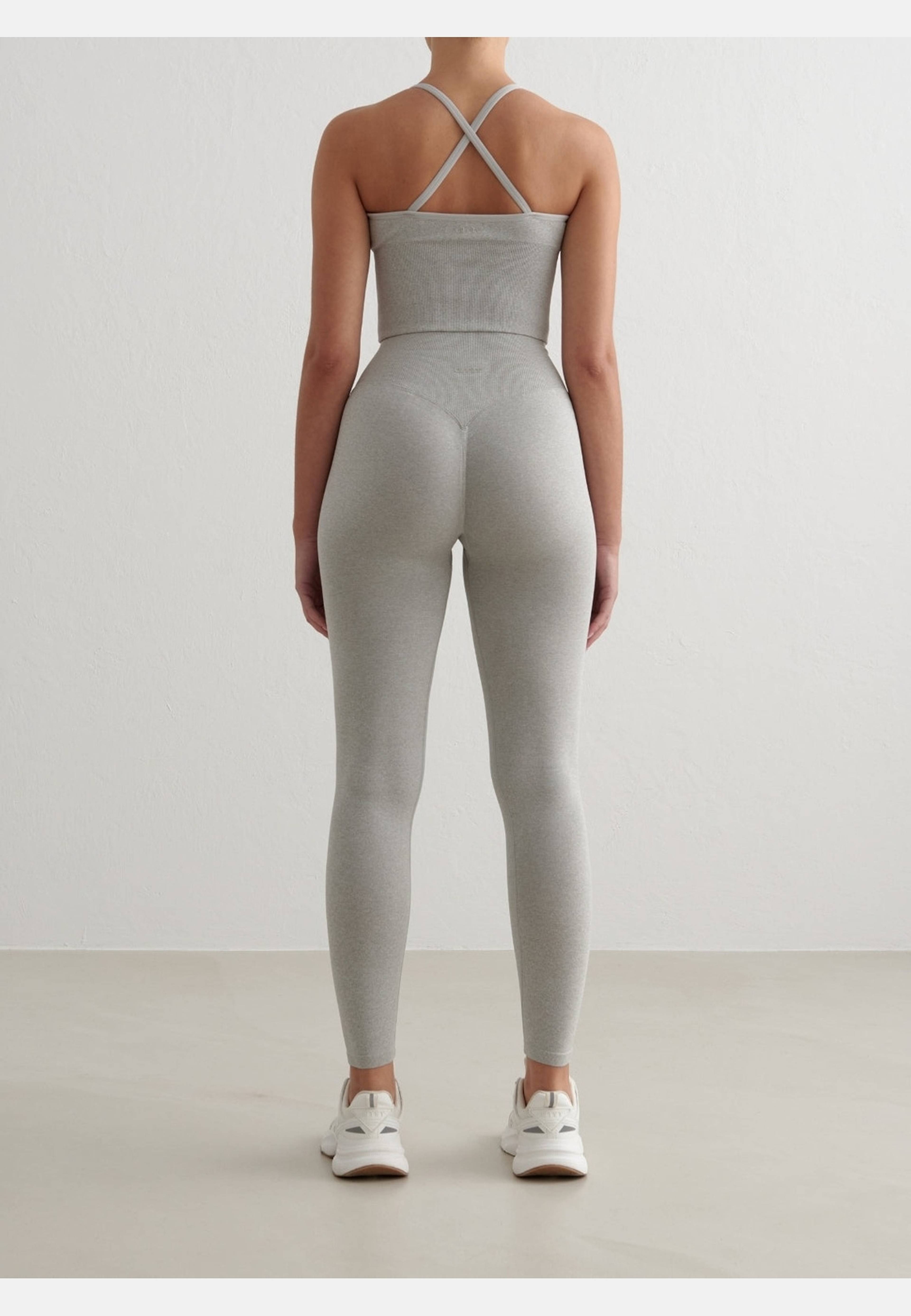 Shape Seamless Cross Back Bralette, från aim'n, i färgen grey melange. Klicka för att öppna bilden i stort format
