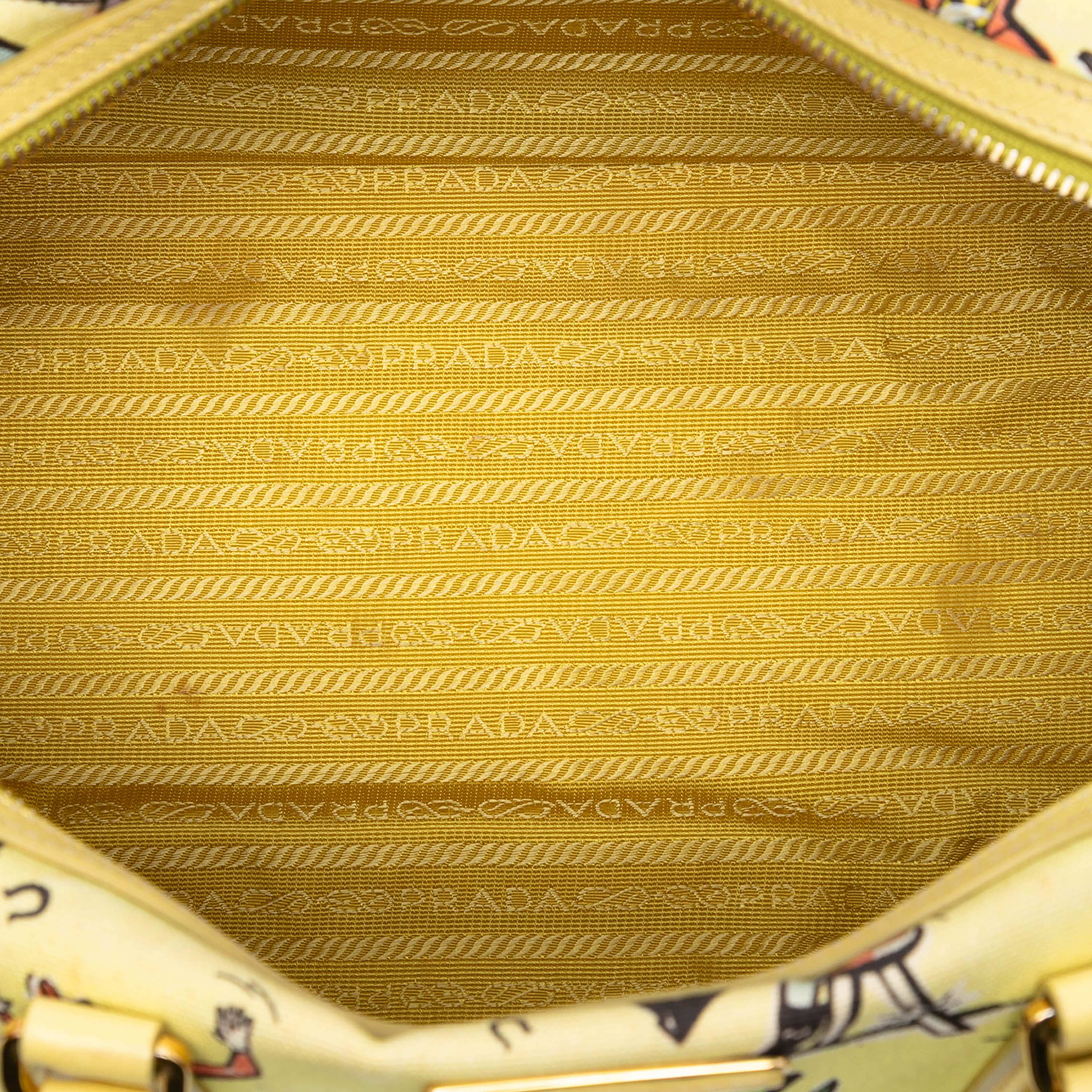 Prada Canvas Canapa St Foula Stampato Satchel, från Luxclusif, i färgen yellow. Klicka för att öppna bilden i stort format