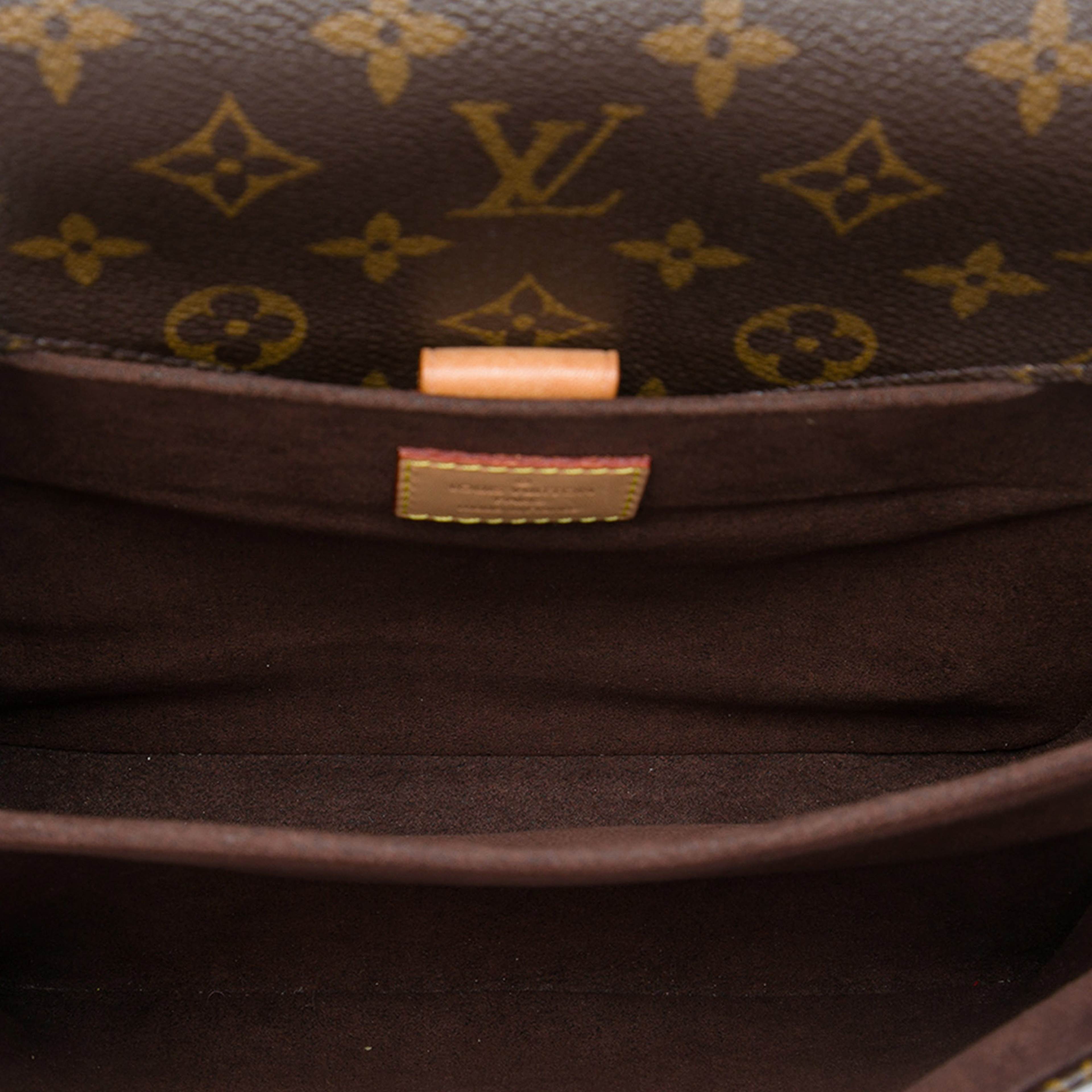 Louis Vuitton Monogram Pochette Metis, från Luxclusif, i färgen brun. Klicka för att öppna bilden i stort format