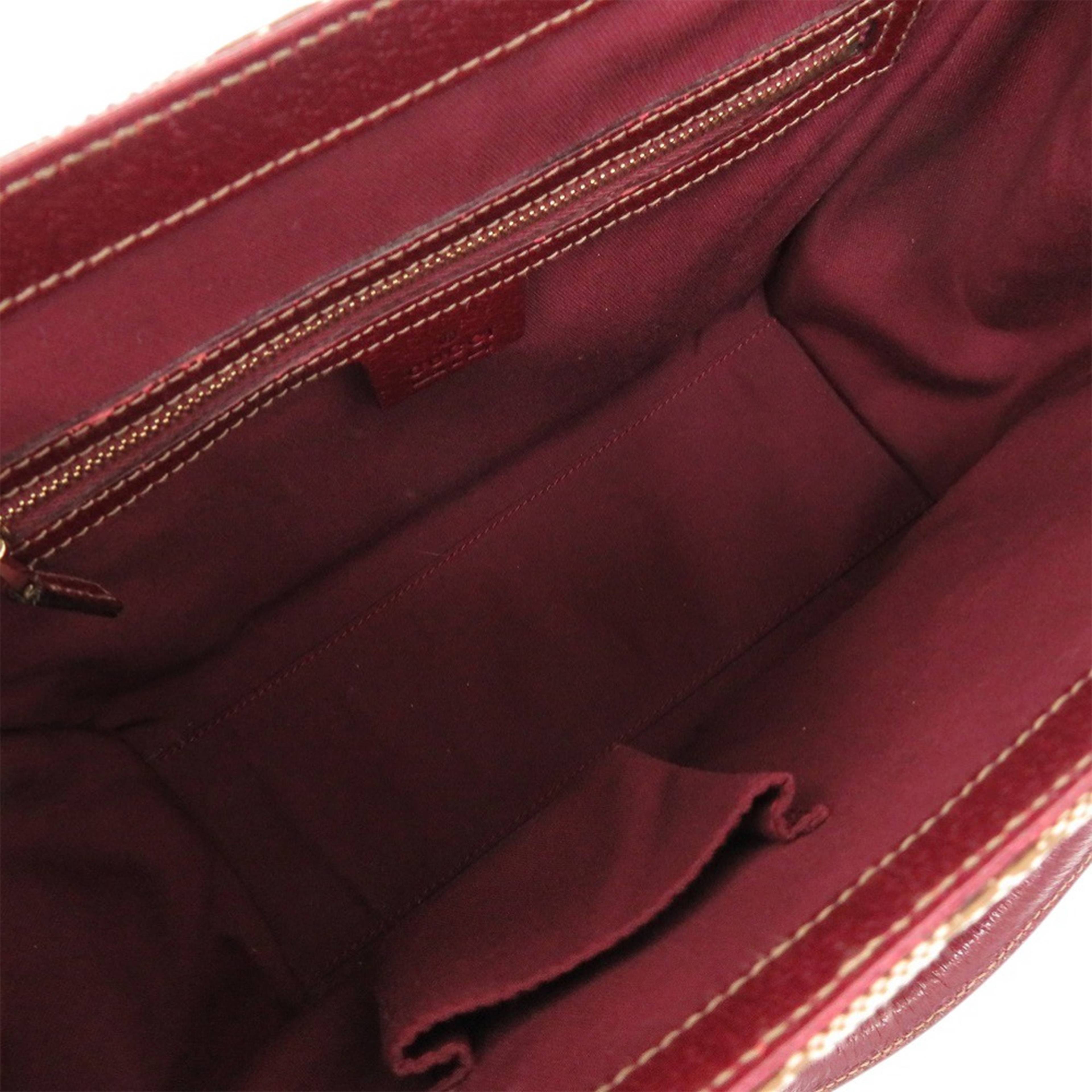 Gucci Gg Canvas Nailhead Handbag, från Luxclusif, i färgen beige. Klicka för att öppna bilden i stort format