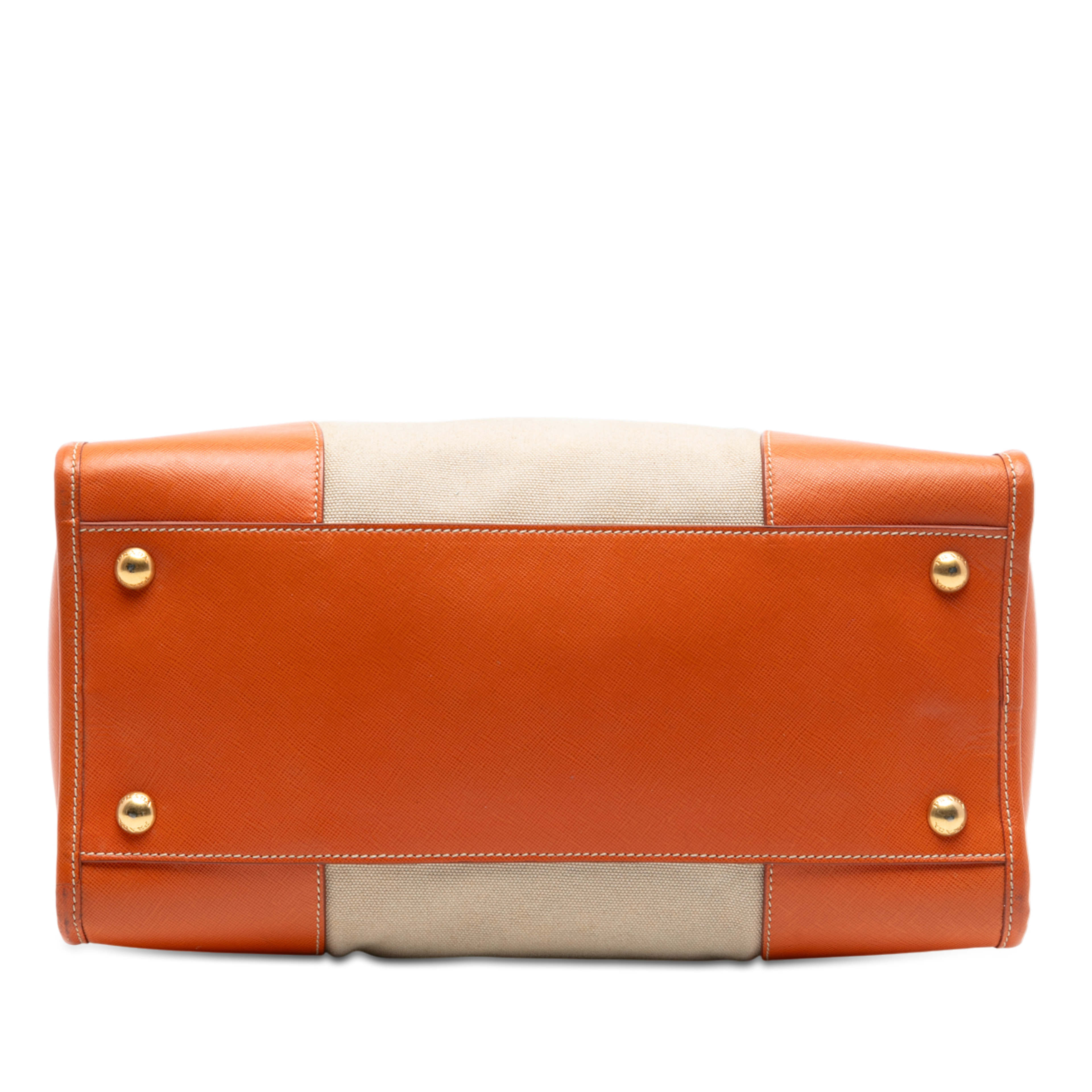 Prada Saffiano Trimmed Canvas Canapa Satchel, från Luxclusif, i färgen beige. Klicka för att öppna bilden i stort format