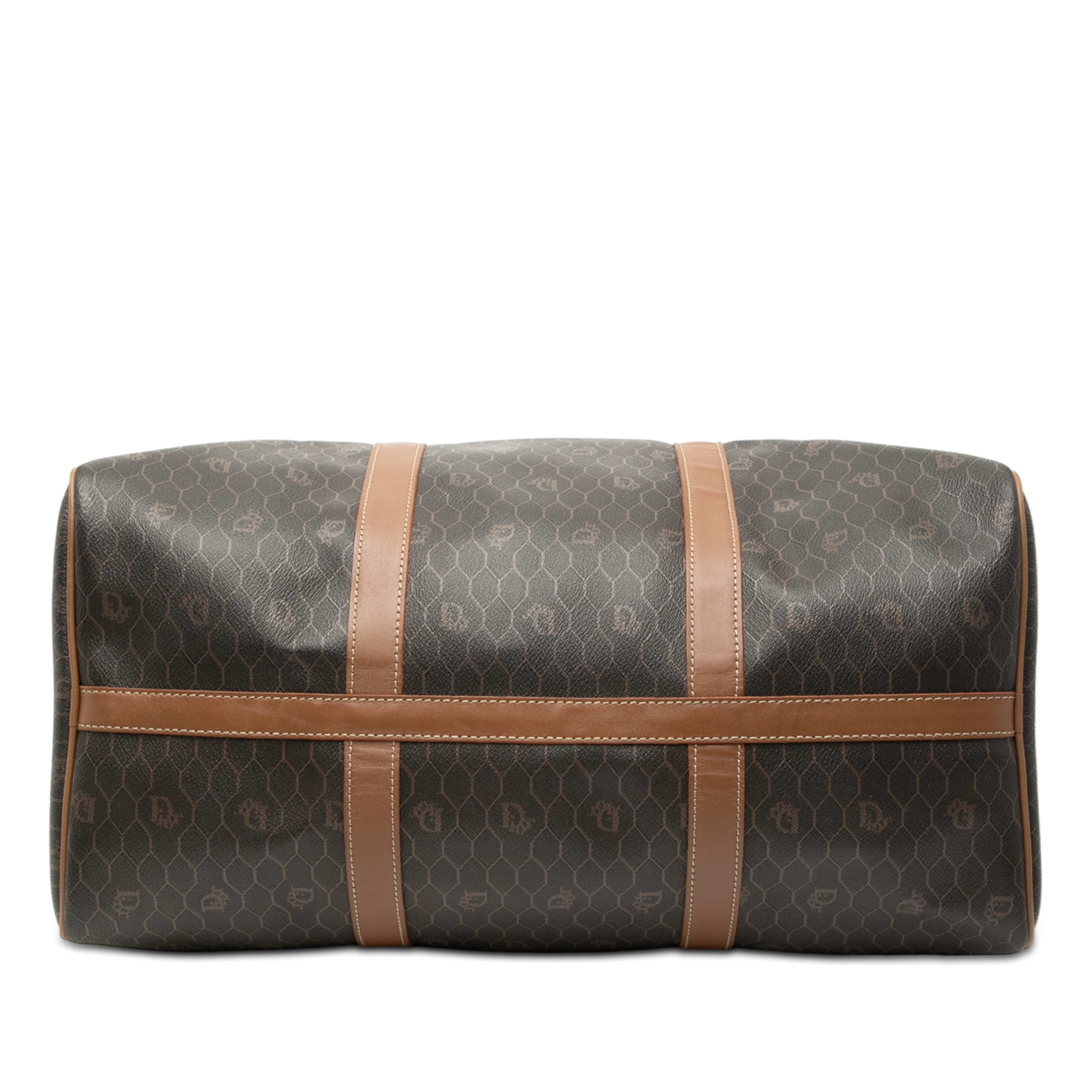 Dior Honeycomb Coated Canvas Travel Bag, från Luxclusif, i färgen svart. Klicka för att öppna bilden i stort format