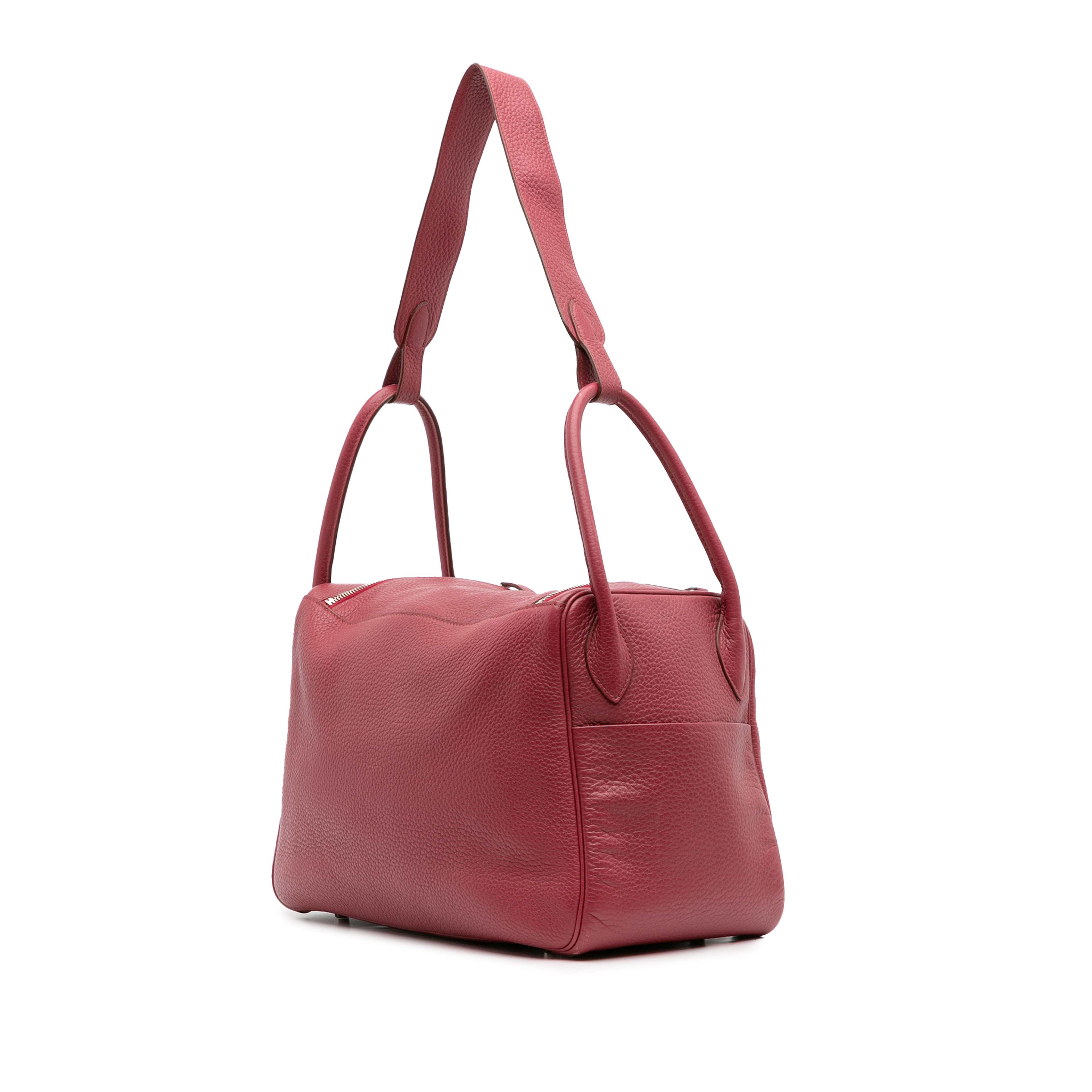 Hermès Clemence Lindy 34, från Luxclusif, i färgen dark red.
