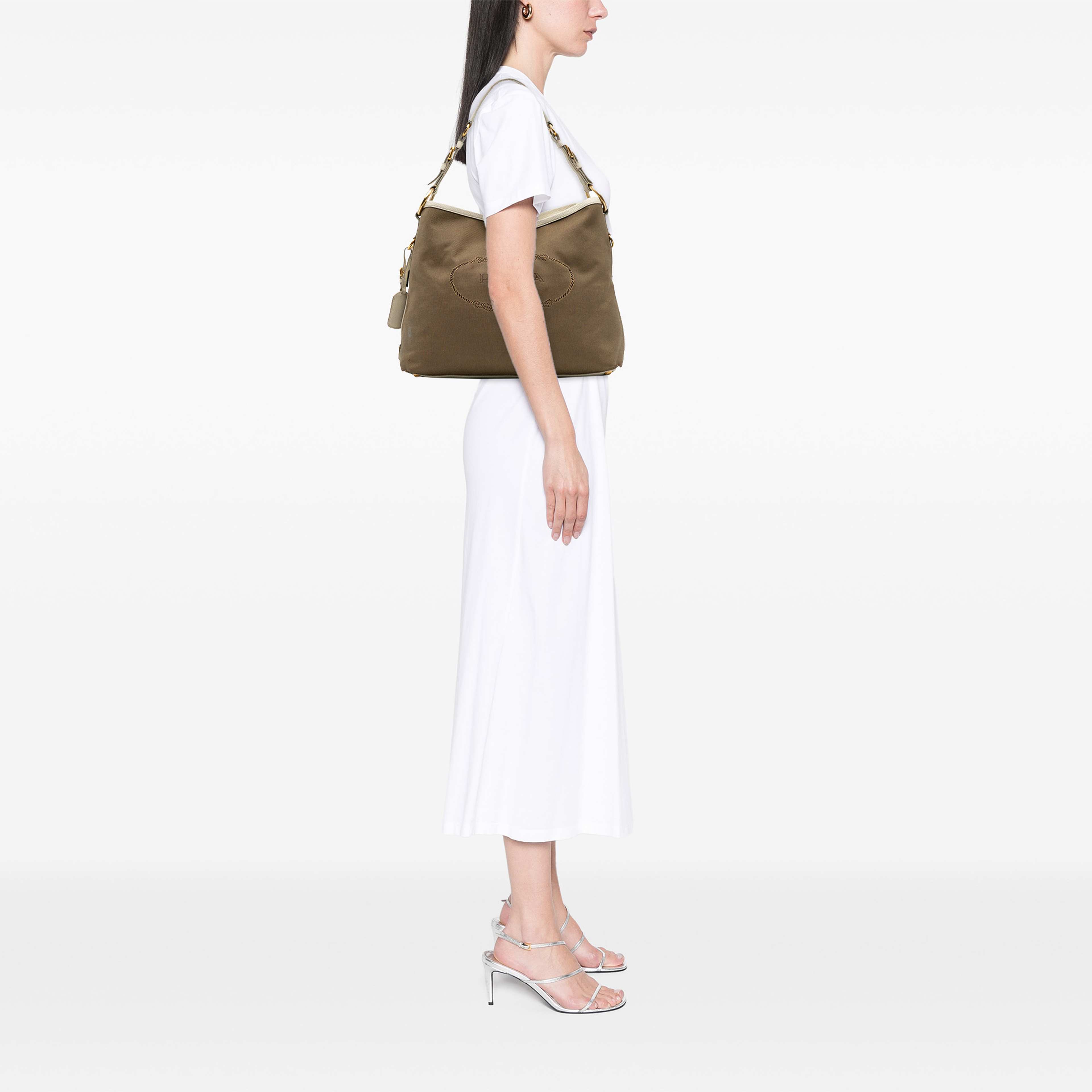 Prada Canvas Canapa Logo Shoulder Bag, från Luxclusif, i färgen vit. Klicka för att öppna bilden i stort format