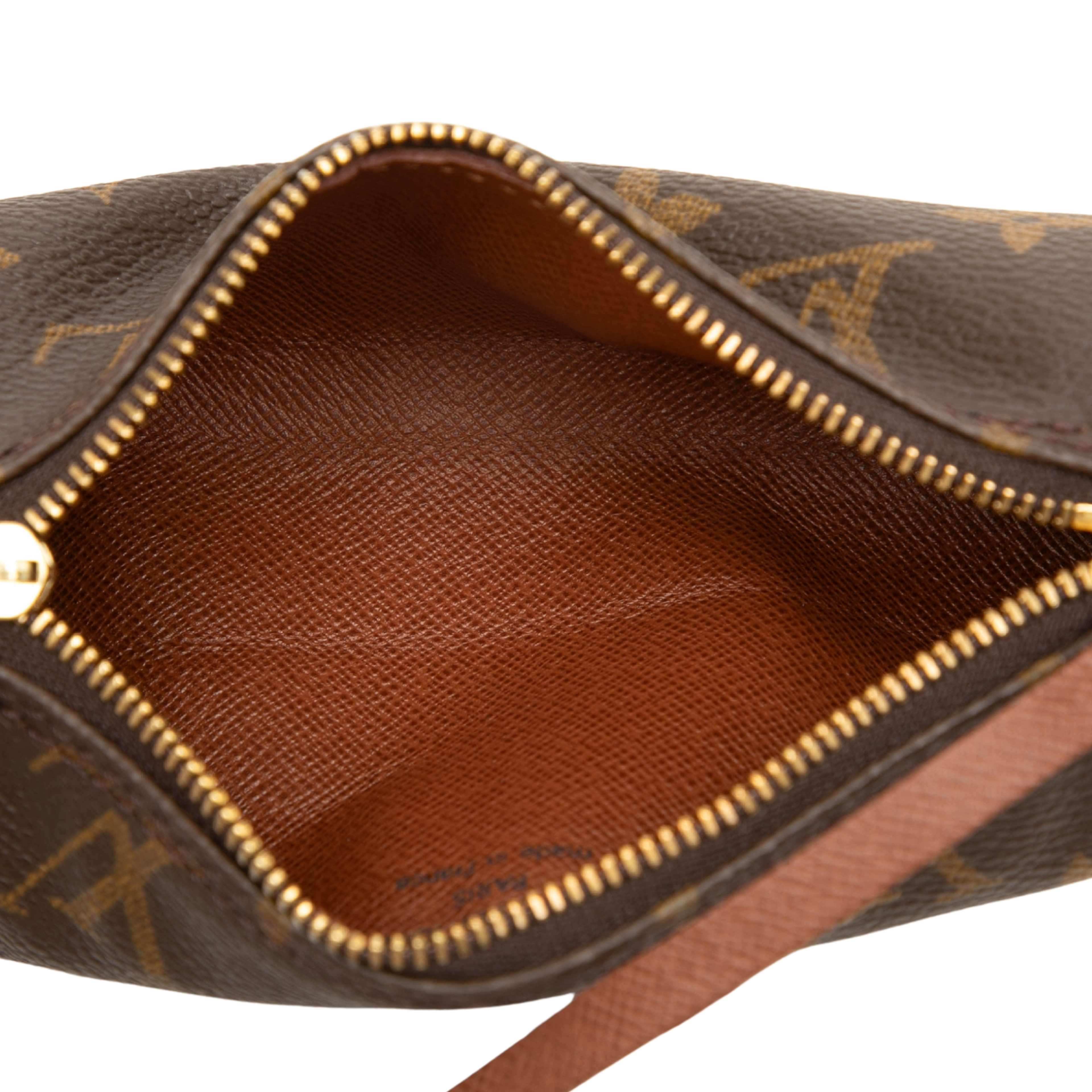 Louis Vuitton Monogram Papillon Pochette, från Luxclusif, i färgen brun. Klicka för att öppna bilden i stort format
