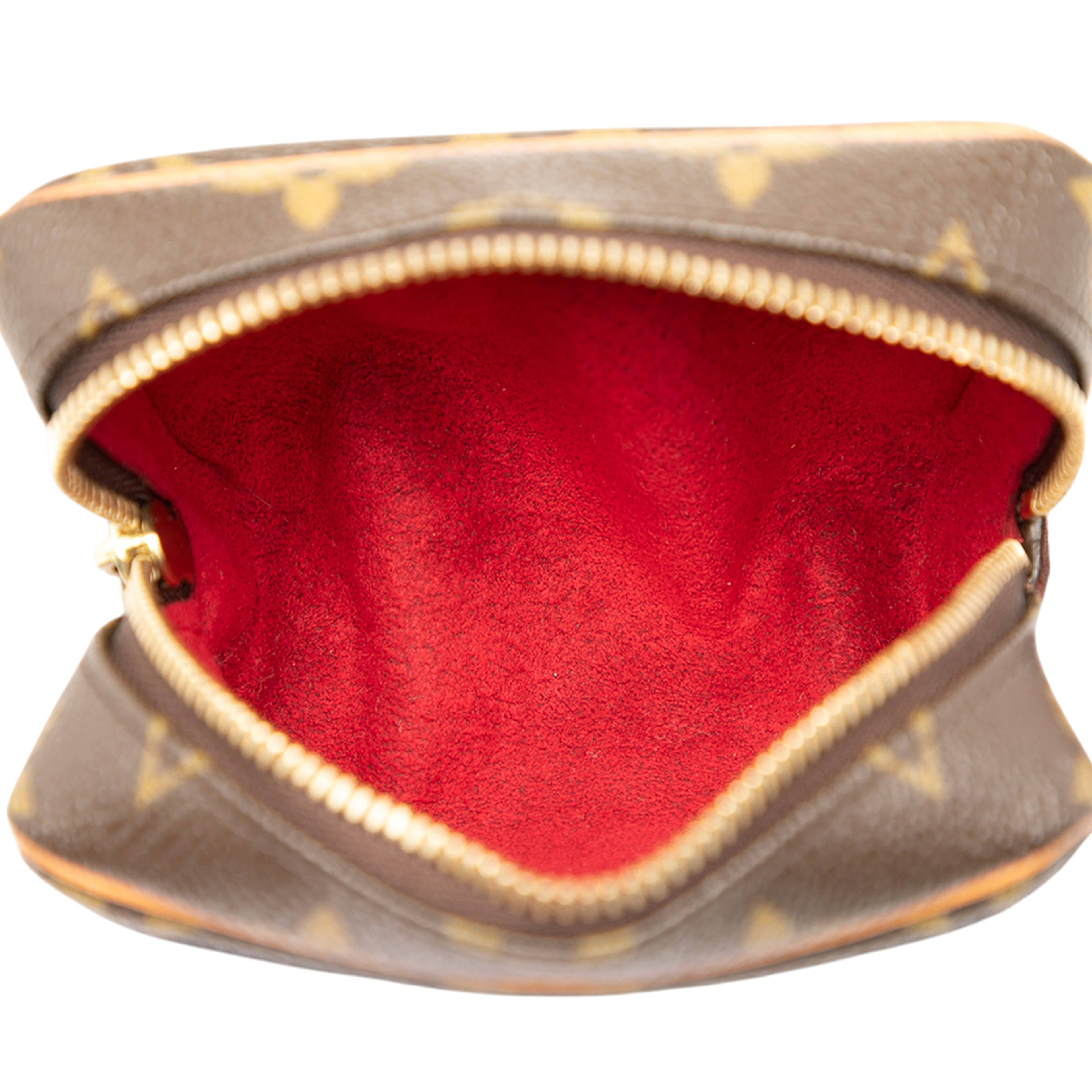 Louis Vuitton Monogram Trousse Wapity, från Luxclusif, i färgen brown. Klicka för att öppna bilden i stort format