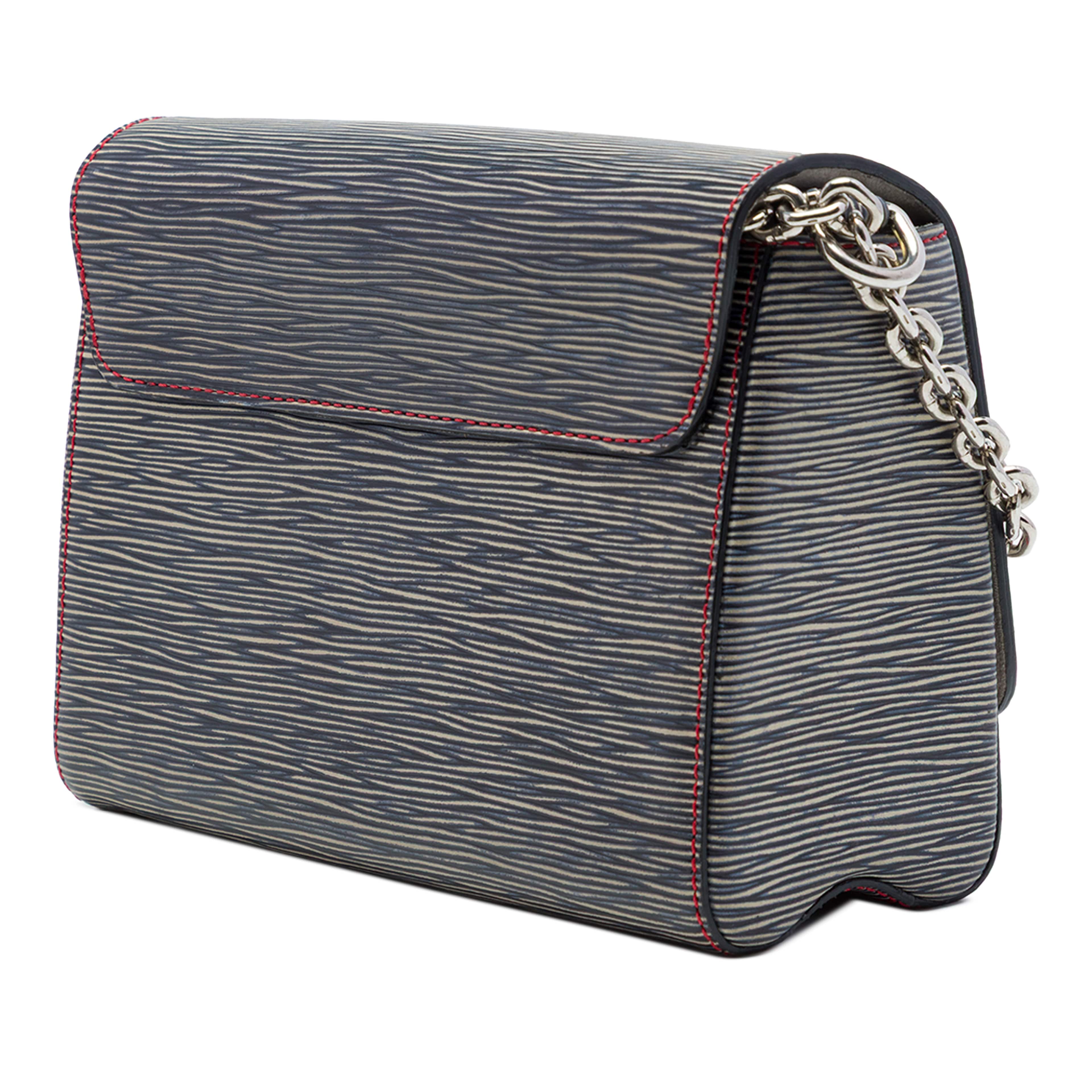 Louis Vuitton Epi Denim Twist Mm, från Luxclusif, i färgen blå. Klicka för att öppna bilden i stort format