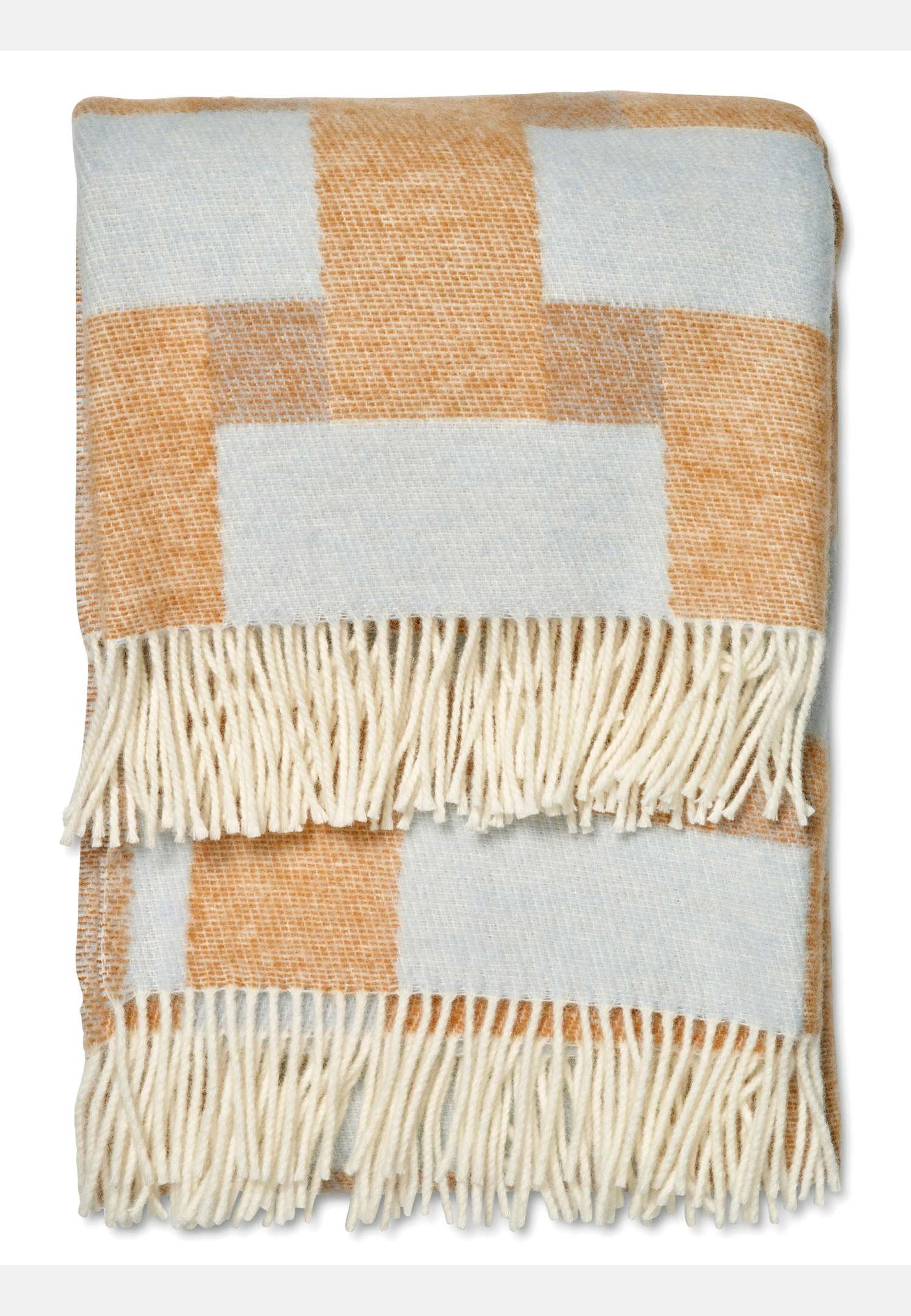 Pläd Weave, från Classic Collection, i färgen terracotta. Klicka för att öppna bilden i stort format